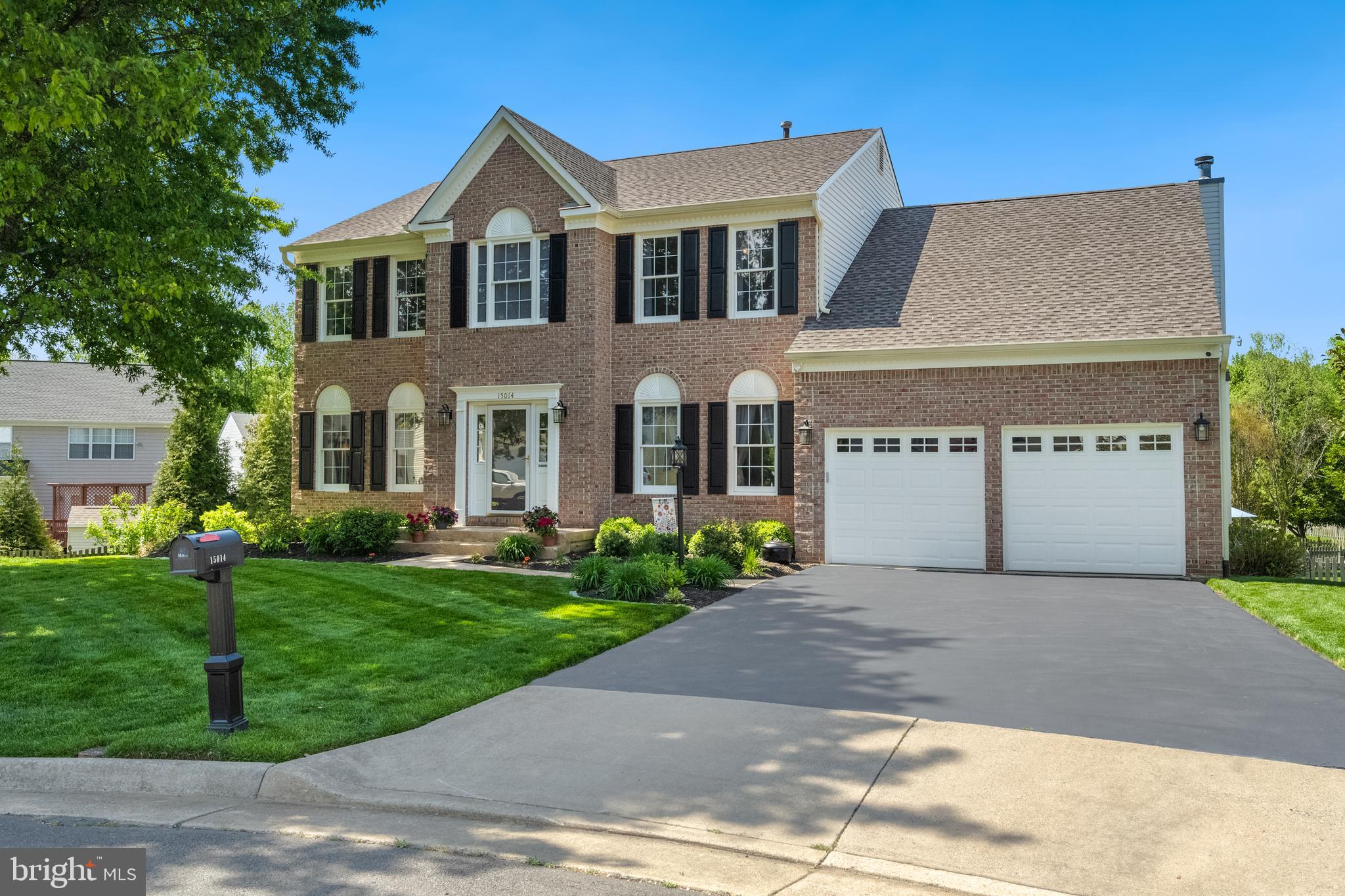 Set on a beautifully landscaped 0.41-acre cul-de-sac lot in Lake Terrapin, this distinguished residence pairs timeless elegance with a resort-inspired lifestyle. Thoughtfully updated and meticulously maintained, the home offers refined interiors and a truly exceptional outdoor sanctuary. Inside, warm solid oak hardwood floors and extensive architectural moldings create an atmosphere of sophistication. The formal living room opens seamlessly to the dining room, adorned with crown molding, decorative wall panels, and a bowed bay window. A front office or library provides a stylish and functional workspace. The heart of the home lies in the updated kitchen, featuring professionally glazed cabinetry, quartz countertops, a contrasting center island with breakfast bar, stainless steel GE appliances, and a pantry with natural hardwood doors. A sunlit breakfast room, with a newer sliding glass door to the rear deck, opens to the adjoining family room boasting extended ceiling height, a marble-style fireplace with custom surround, dentil molding, and recessed art lighting. Upstairs, the serene primary suite includes a walk-in closet with custom built-ins and a fully remodeled spa-inspired bath with a clawfoot tub, marble-style shower, and dual vanity. Three additional bedrooms offer designer ceiling fans and easy access to a beautifully remodeled hall bath, which features quartz countertops, premium tilework, and modern chrome fixtures. The walk-out lower level expands the living space with a media room featuring built-in speakers and projector, a dry bar, game area, full bath, and a den or hobby space. It's the backyard retreat that truly sets this home apart. A premium Trex deck with built-in lighting and arbor pergola overlooks the show-stopping saltwater heated pool—complete with stamped concrete patio, elegant fencing, and lush, low-maintenance landscaping. Whether hosting gatherings, enjoying sunset swims, or relaxing beneath the stars, this space delivers the ultimate in outdoor living. The fully fenced yard offers generous room to play, garden, or unwind, all nestled within a vibrant community offering a neighborhood pool, tennis courts, playground, and lakeside trails. Offering the perfect balance of luxury and lifestyle, this extraordinary home is a rare opportunity to enjoy resort-style living every day. Newer HVAC + Hot Water Heater + Garage Doors + Trex Deck (2021), Hardwood Floors (2020), Kitchen (2019), Primary Bath + Hall Bath (2019), Pool (2019), Roof (2017), and much more.