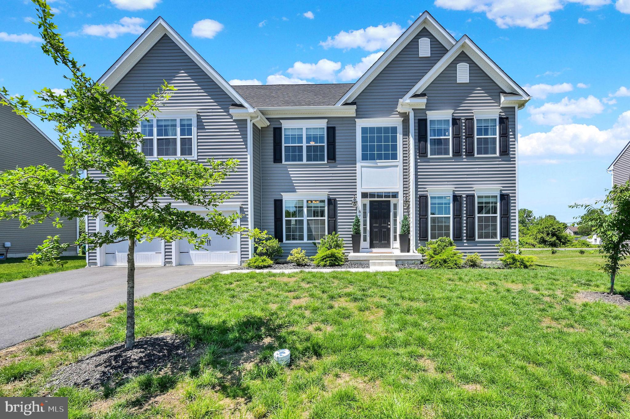 Why wait for new construction? Check out this amazing home in Smyrna’s sought‑after Big Oak community, 67 Wavyleaf Dr offers 4 bedrooms, 2.5 baths, and 3,237 sq ft of refined living space. Built in 2024, this colonial‑style residence features a dramatic two‑story foyer, formal living and dining rooms, and a two‑story great room that creates an open, airy centerpiece for the home. 

This Waterford model includes a first-floor office, plus a chef‑inspired kitchen with a center island, breakfast nook, butler’s pantry, and the option for a morning room or 4' great‑room extension. Upstairs, the landing overlooks the great room and leads to a luxurious owner’s suite with French doors, generous closet space, a spa‑style bath and large sitting room. 

Set on a .25-acre lot with fenced rear yard, 2‑car garage, the home offers modern conveniences including energy‑efficient appliances, natural gas heating, 9'+ ceilings, and an unfinished full basement for future expansion with bathroom rough-in.  Located just 12 miles from Dover and within easy reach of Wilmington, Philadelphia, and Delaware beaches, this fast‑growing neighborhood is known for its convenience and strong value. This home is priced to sell and has VA assumable loan with a 5.75 % interest rate for Veterans!