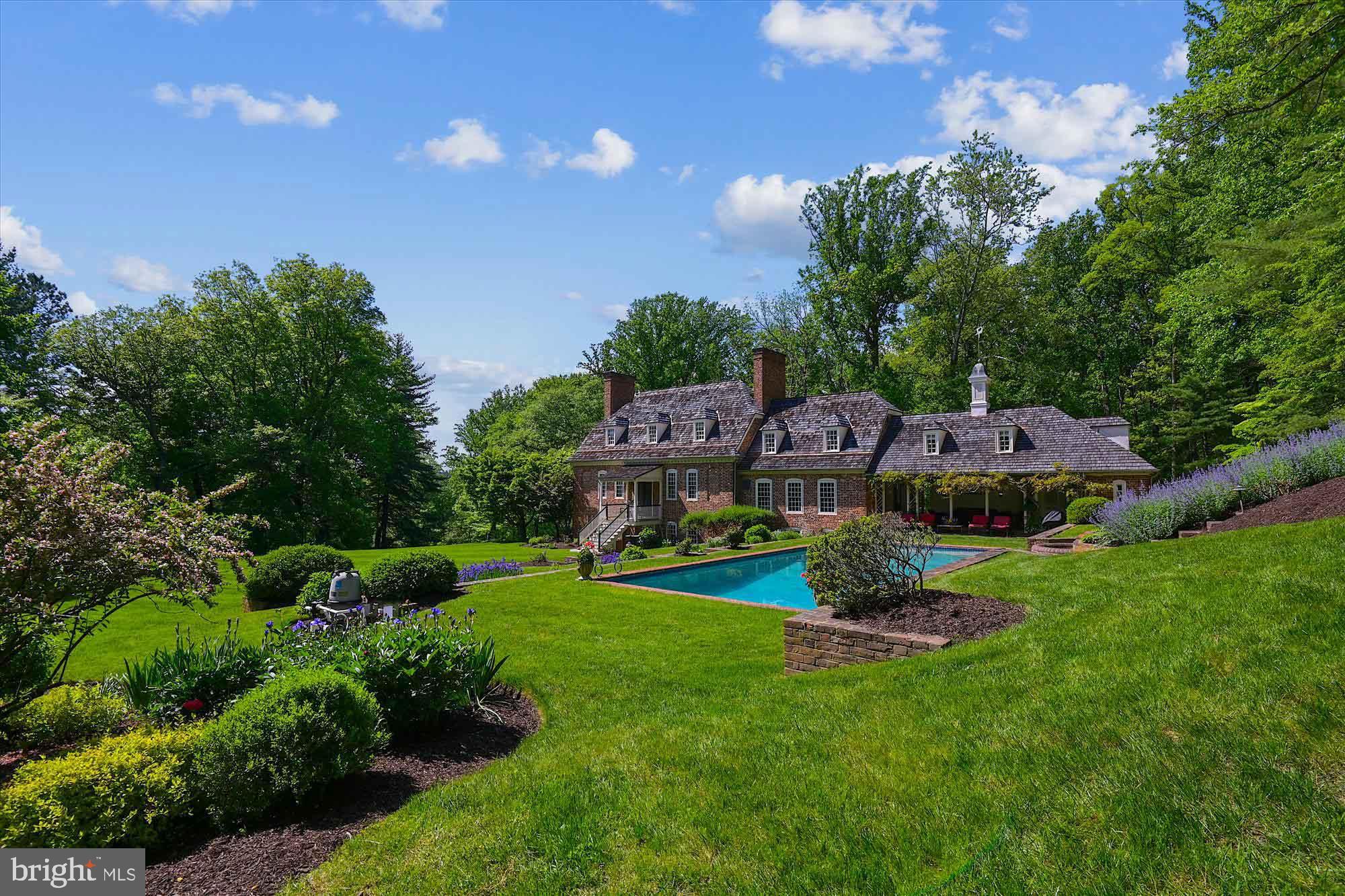 Live authentically.  BEST OFFERS DUE BY FRIDAY, JULY 21 MIDNGHT. SELLER PREFERS NO ESCALATION CLAUSES. The Ross House was built beside the Potomac River in Bladensburg, Maryland in 1749 by Dr. David Ross, a surgeon in the Continental Army. During the War of 1812, it was used as a hospital for British and American soldiers. The home was carefully dismantled in 1957, but 22,000 bricks, windows, flooring, paneling , doors, and handmade nails were preserved for five years. In 1962, Leonard C. Crewe Jr. sought to build a colonial style home. He commissioned Bryden B. Hyde, a Baltimore-based architect and an officer for the Society for the Preservation of Maryland Antiquities, to design the home. Hyde suggested to Crewe to reconstruct a historic home instead. John Hurst Purnell Jr., an architect who specialized in the restoration of 18th and19th century homes, oversaw the project as a general contractor. The house was rebuilt with mortar made from oyster shells, a historically accurate additive. In addition to original elements from the Ross House, authentic mid-18th century materials from other buildings were used when needed. The successful reproduction of the original Ross House was completed in three years on the property known as Preservation Hill. The historical home has been meticulously preserved with concealed modern touches throughout. Masterful landscaping around the property includes indigenous plants and flowers known to early Maryland Colonials. Crewe enjoyed the process and was a dedicated preservationist. He set his sights on adding a guest house. 
The Yeates House was built around 1738 in Turners Creek, Maryland. It was owned by Colonel Donaldson Yeates, commissary officer for the Eastern Shore in the Continental Army. Yeates purchased a seven-acre parcel with Tobias Rudolph, merchant of Cecil County, in 1770. Named Knocks Folly, it became a thriving village. In the 1960s, the president of the Kent Historical Society attempted to save the Yeates house at its original site. In the late 1960s, Leonard C. Crewe Jr. purchased the Yeates House for $5,000 to accompany the Ross House as a guest cottage on Preservation Hill. He again gathered Bryden B. Hyde as the architect and John Hurst Purnell Jr. as the builder to work on the reconstruction of the Yeates House. It took three years to complete the project. The preservation of history combined with modernity is eminent throughout the home.
A compelling package on a total 10.03 of  acres consisting of two separately deeded parcels. The main house is sited gracefully on 6.75 acres. Old soul intact and modern lifestyle amenities in place. Glorious outdoor living sets the tone. A covered outdoor room with incredible brick flooring becomes the hub of all seasonal gatherings with your glistening pool and balanced native gardens in the distance. Tranquility abounds with the sounds of your tiered waterfall as a constant for all of your endeavors. Unwind in your sauna. Grab a bottle from the wine cellar, and cozy up by one of your ten working fireplaces, eleven total in the main house. Simply magnificent. Guest cottage is set gently on 3.28 acres and consists of an additional two to three bedrooms, kitchen, dining, and den. Comfortable and endearing. Once in a lifetime experience awaits you. A rare offering indeed. Comcast internet. Please book your appointment now. In the event the active date changes, you will be notified. Cultivate your existence. The art of uniting human and home. Please see listing MDBC2060962 for the main house and listing MDBC2061146 for the guest cottage. Tax assessment and related information in listing is for main house only.