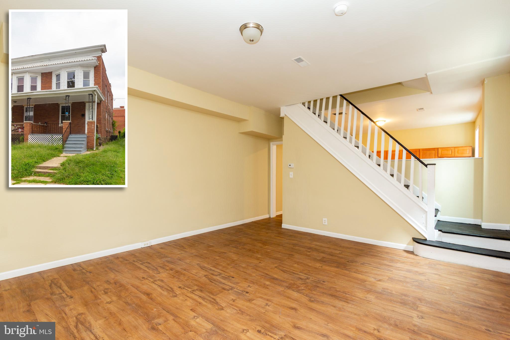 RECENTLY UPDATED PORCH FRONT ROWHOME WITH LARGE ROOM SIZES!  Vinyl wood flooring throughout, main level w/ spacious living room, eat-in kitchen (stove and refrigerator to be installed), main level bedroom, and laundry room, upper level w/ 3 additional bedrooms & 1 full bath.  Located close to colleges, Belvedere Square, and tons of shopping and restaurants!