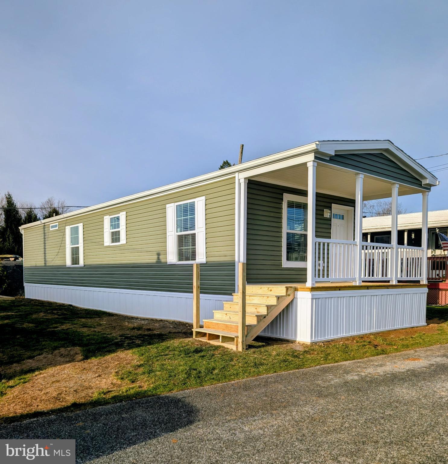 Brand new Champion single wide mobile home in Hidden Valley Estates, a well kept community with easy access to major routes.  Open floor plan, kitchen w/stainless steel appliances, primary bedroom with 2 closets, convenient laundry area in hallway, laminate flooring throughout, covered from porch/deck and more.  Unit comes with a limited warranty from manufacturer. Don't miss this new unit is a great location and priced to sell.