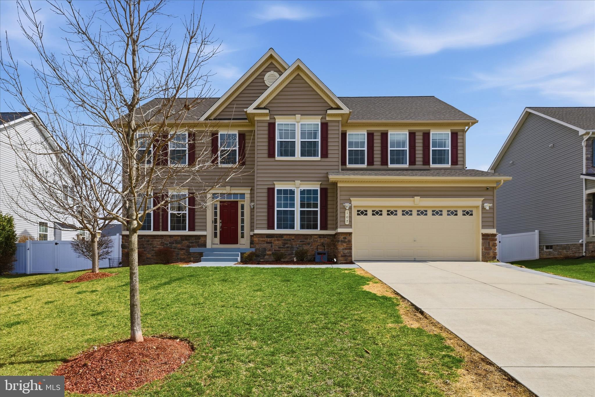 Fantastic opportunity to own a truly one-of-a-kind colonial home, completely renovated in 2025 and offering an impressive amount of finished living space filled with natural light throughout. The main level features beautiful wood floors and a thoughtfully designed layout, including a gourmet kitchen with quartz countertops, stylish quartz backsplash, farmhouse sink, quartz wrapped island, new cabinetry, upgraded stainless steel appliances, gas range, and wine chiller. The home offers elegant living and dining rooms with tray ceilings, a spacious family room with a unique contemporary fireplace, a main-level office, and a bright sunroom. Upstairs, the luxurious primary suite includes a sitting area, an enormous walk-in closet, and a spa-inspired bath with marble and quartz finishes, a glass walk-in shower, and a jetted tub, There are three additional generously sized bedrooms.  Beautifully updated hall bath with glass shower. The fully finished basement adds even more living space with a fifth bedroom, full bath, large recreation room, exercise room, and den. Additional highlights include a two-car garage, a new roof installed in 2025, and an expansive stamped concrete patio overlooking a private, fenced backyard, perfect for entertaining or relaxing.