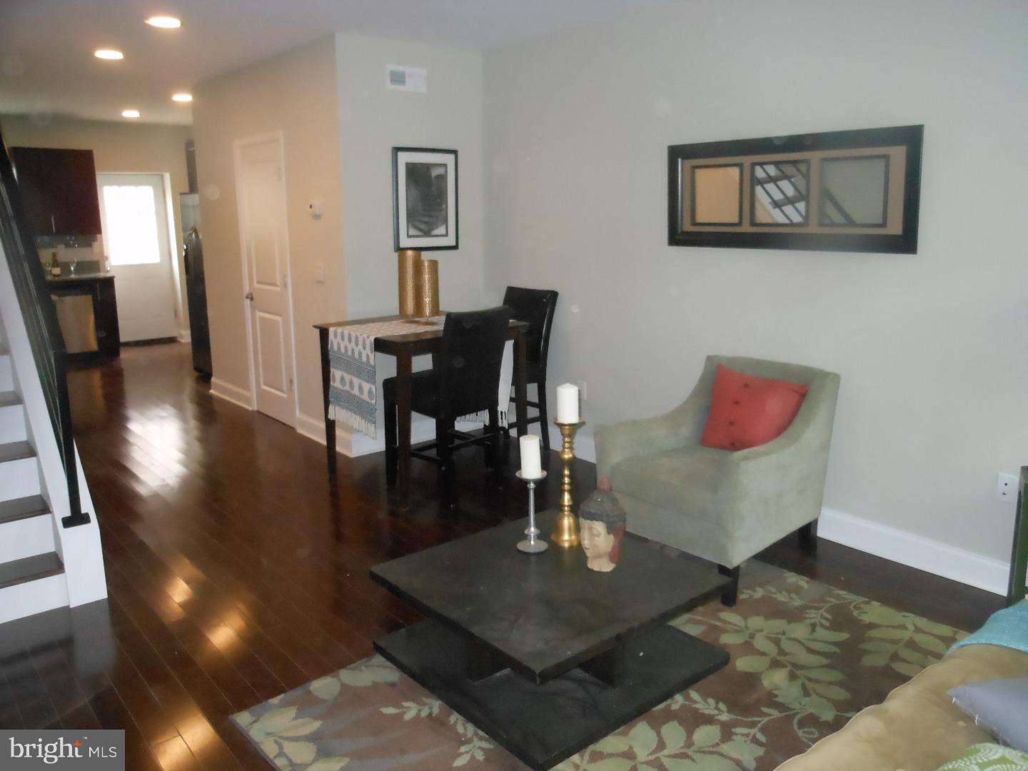 Enter in to this brand new rehab and you'll love what you see. The living room has nice cherrywood hardwood floors, high hat lighting. The stunning kitchen has gorgeous granite coutertops, solid cherrywood cabinets, stainless steel appliances. On the second floor, you will find 2 nice sized bedrooms with hardwood floors, each with closets. There is a nice comfortable bright bathroom. You will also find your laundry area on this floor. Move on up to third floor and you will love the master suite with its own bath and walk in closet. And wait until you see the view from your roof top deck. There is also a nice sized yard for outdoor entertaining. And yes there is also a finished basement.