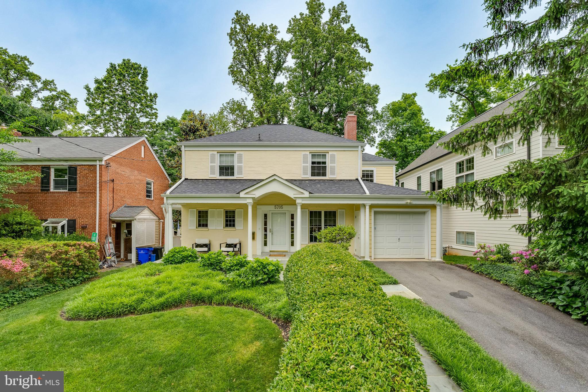 Welcome to 5705 Northfield Rd, nestled in the highly sought-after Greenwich Forest neighborhood of Bethesda and within the desired Walt Whitman High School-cluster, this newly expanded and updated Colonial offers an elevated living experience. Situated just about a mile from downtown Bethesda and less than a mile from NIH, with Greenwich Forest Park mere steps away, this location seamlessly blends convenience with tranquility.

Step onto the beautifully landscaped walkway and be greeted by the inviting charm of the front porch.. Light-filled, spacious, and versatile, the main level boasts an ideal layout for both grand entertaining and cozy gatherings. A formal living room with a gas fireplace, a generously sized dining room adjacent to the island kitchen, a cozy family room, and a showcase great room skillfully crafted in 2022 by Case Architects & Remodelers with vaulted ceilings and expansive Anderson windows overlooking the peaceful backyard create an ambiance of warmth and sophistication. The adjacent morning room, filled with sunlight, offers seamless access to the deck and backyard. Completing the main level are a convenient powder room and a well-designed mudroom with built-in storage, cubbies, bench, and side access.

On the upper level, you'll find four generously proportioned bedrooms, including the Premier Suite adorned with vaulted ceilings, dual closets including a spacious walk-in, and a premier bathroom featuring a double vanity, separate shower, and a built-in tub. Another en-suite bedroom boasts vaulted ceilings and a private bathroom, while two additional bedrooms share a well-appointed hallway bathroom with a tub. The upper level also offers access to the attic, perfect for storage and housing the second HVAC system, added in December 2023.

The lower level of the home offers a versatile space, including a welcoming rec room with custom built-ins and a full bath, ideal for hosting guests or entertaining. Additionally, the bonus room adjacent to the laundry and mechanical room can serve as a designated home-gym or office space adding convenience and functionality.  
  
Outside, the private driveway and one-car garage equipped with an EV charging station provide ample parking and storage options. The fenced backyard offers a serene retreat, perfect for outdoor relaxation and entertaining.

This exceptional home seamlessly blends modern design with timeless charm, offering an unmatched opportunity to live in one of Bethesda's most coveted neighborhoods. Don't miss your chance to make this your home.