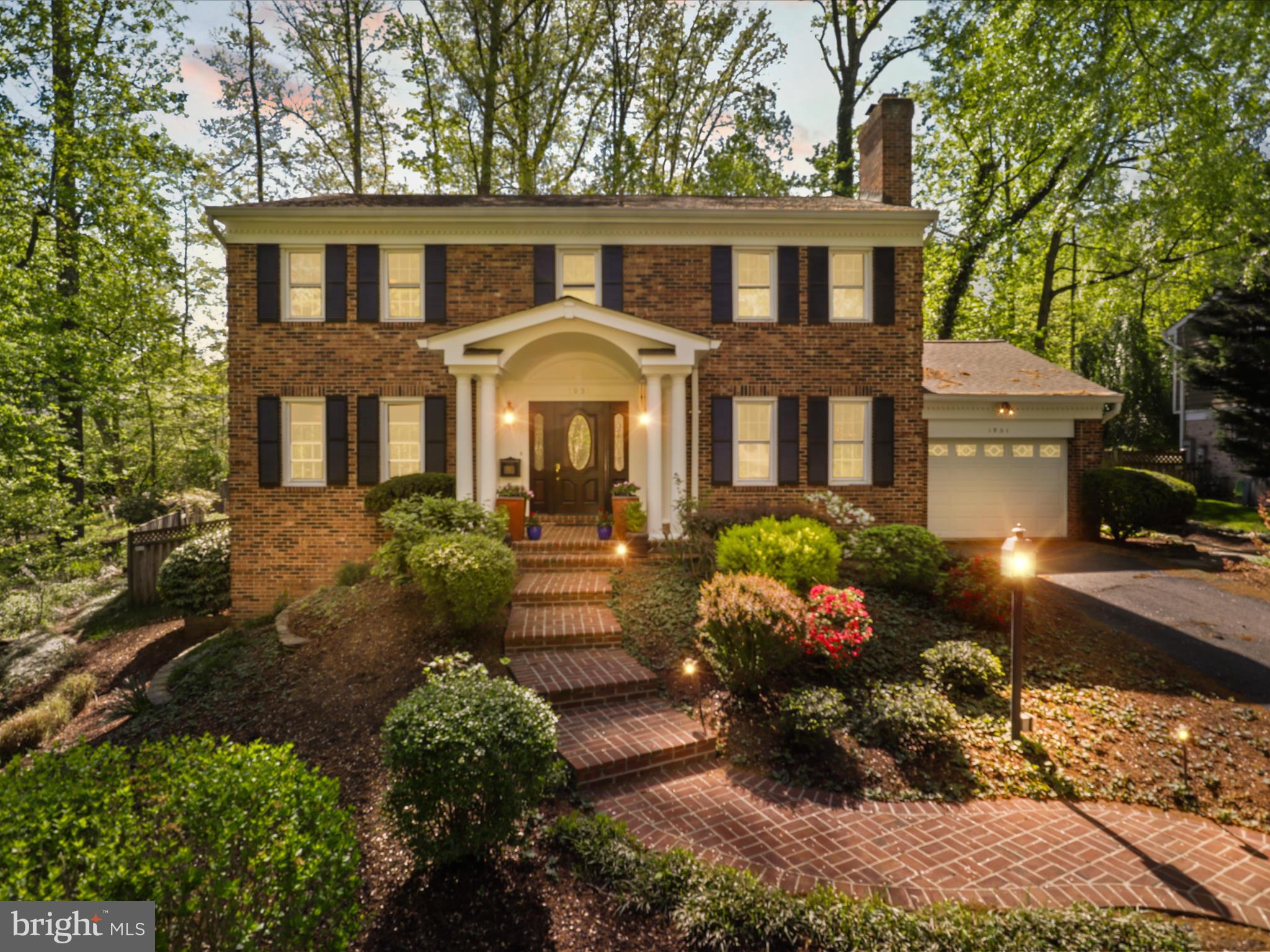 Nestled in the coveted Franklin Park neighborhood, this timeless all-brick colonial offers the perfect blend of classic charm and modern updates on a generous .41-acre wooded lot.
The thoughtfully remodeled kitchen features maple cabinetry, granite countertops, and stainless steel appliances, opening to a sun-drenched breakfast room ideal for casual dining. The main level also boasts a warm and inviting family room with a wood-burning fireplace, along with gleaming hardwood floors that carry throughout both the main and upper levels.
Upstairs, you'll find four spacious bedrooms and beautifully updated bathrooms. Step outside to a custom stone patio with built-in lighting — perfect for entertaining or simply enjoying the lush, private surroundings.
The finished lower level adds exceptional versatility with a recreation room featuring a raised-hearth fireplace, plus a dedicated office or media room to suit your lifestyle needs.
A rare opportunity to own a distinguished home on one of the area's most picturesque lots.