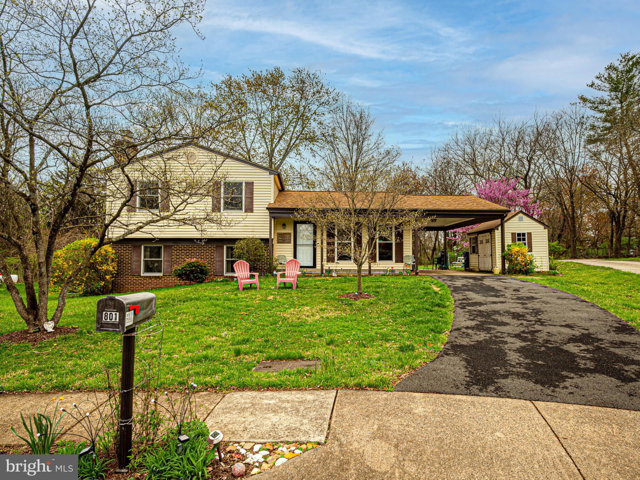 Location, location, location    Town of Herndon, cul-de-sac, backs to parkland with stream adjoining golf course!  Peace, tranquility, convenience, comfort and more!  Furnace and fireplace have been converted to gas for extra warmth and savings.   Roof and siding replaced in 2022, HVAC in 2025 and hot water heater was also recently replaced.  Brazilian cherry flooring on main level and up the stairs and into primary bedroom.  Updated kitchen with tremendous counter and cabinet space, picture window lets the back yard in, upgraded sliding door to back deck.   Primary bedroom has great closet space with direct access to full bath and an amazing sitting room/sunroom/office all in one with skylight and vaulted ceiling with views of dedicated parkland and golf course.  Expanded lower level offers family room with brick raised hearth gas fireplace with mantle, full bath, 4th bedroom, laundry room with separate exterior door and a bonus/hobby room with walk out to patio in back yard.