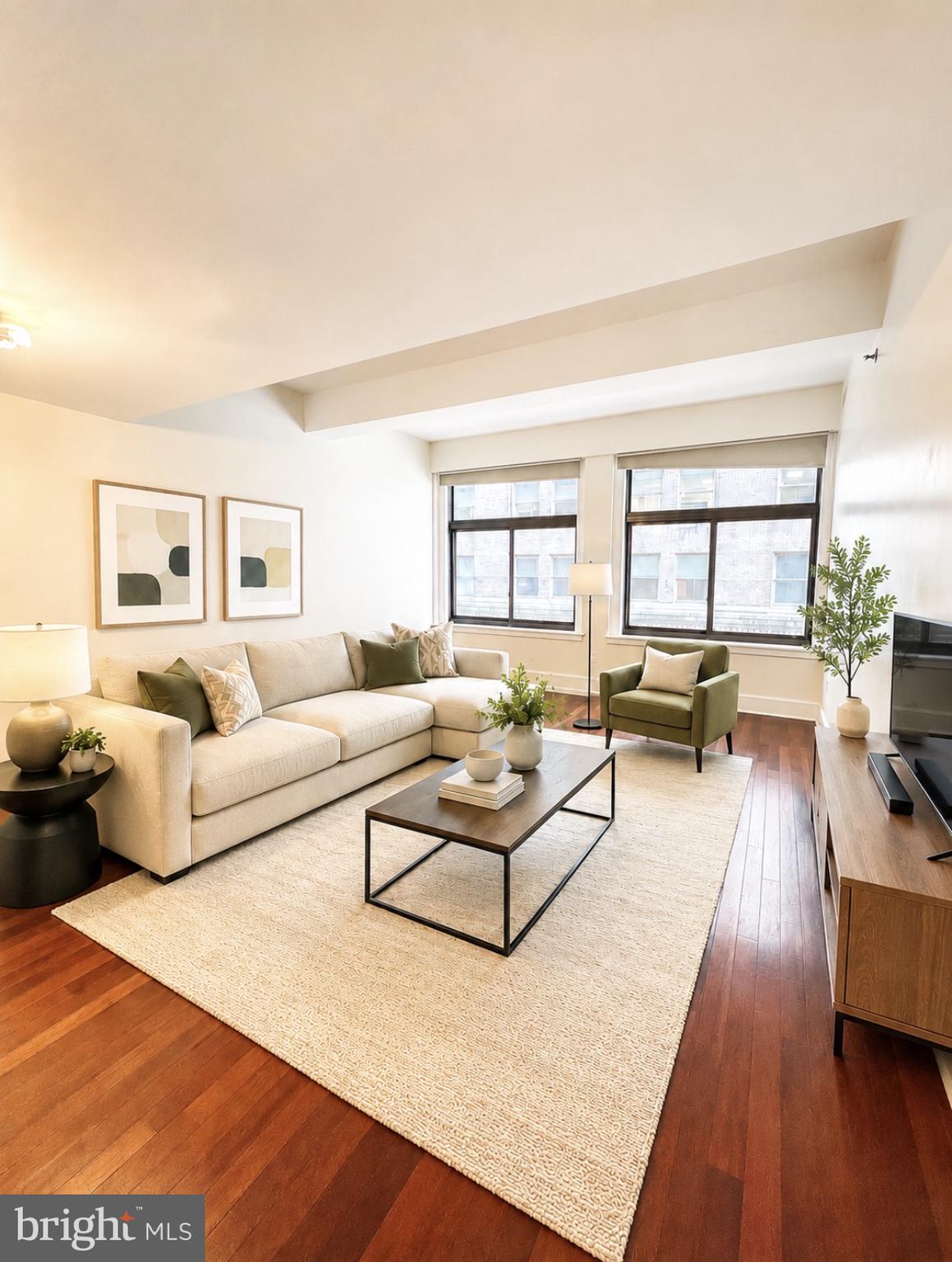 The Ellington | 1BR Condo Steps from Rittenhouse Square
Well-appointed one-bedroom, one-bath condo offering 845 square feet in one of Center City’s most sought-after buildings. Features include 10-foot ceilings, Brazilian cherry hardwood floors throughout, and oversized windows with great natural light.
The kitchen offers white cabinetry, granite countertops, stainless steel appliances, and a breakfast bar open to the living area. The full bathroom is finished in Carrara marble tile with a soaking tub and shower combination.
Building amenities include 24-hour concierge and doorman, fitness center, community room, and on-site maintenance. Monthly condo fee of $828 covers water, sewer, trash, and building maintenance.
Centrally located with easy access to Rittenhouse Square, Suburban Station, Market-Frankford Line, PATCO, and Center City dining and shopping.