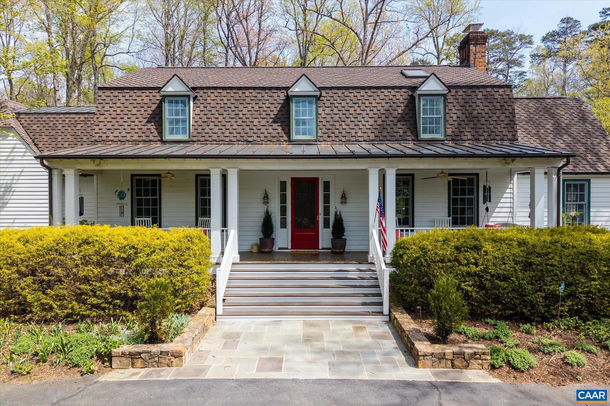 If you envision your Charlottesville lifestyle as including a welcoming family home just West of town and 2-5 minutes to Boar's Head Sports Club, UVA basketball, baseball, soccer and lacrosse games, Farmington Country Club & St. Anne's Belfield School, 995 Old Garth Road may fit the bill. Complete with pool & and an almost 4 acre parcel, this c. 1968 4-5 bedroom offers mid-century character melded with nods to 21st c. living styles.  The graciously scaled foyer opens to the original, formal dining and living rooms.  Off the living room is a cozy den complete with built-ins & 1 of the 3 fireplaces in the home. A large addition to the rear of the home provides an expansive, gourmet kitchen open to a vaulted family room with Tulikivi woodstove for toasty game watching & meal preparation.  Come Spring & Summer, the large sunroom, bluestone terraces & swimming pool invite outdoor living & entertaining. The bonus room over the garage currently serves as the laundry room but could easily be a 5th bedroom.  Between the garage and the kitchen/family room addition is a mudroom and powder room. Open House Saturday & Sunday April 18th & 19th from 1-3.  Public water.,Solid Surface Counter,Fireplace in Den,Fireplace in Family Room,Fireplace in Living Room