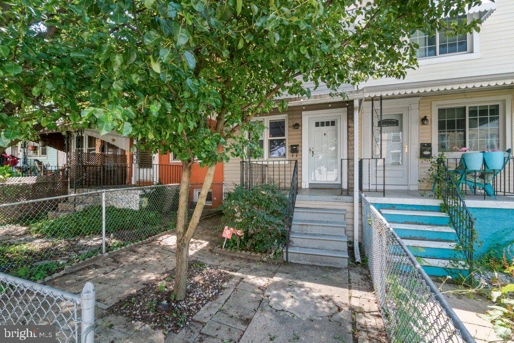 Welcome to 3322 Paine Street, a charming, move-in ready townhome tucked away in the heart of one of Baltimore's most sought-after neighborhoods—Hampden! Just moments from The Avenue, you'll enjoy easy access to some of the city's best local restaurants, coffee shops, boutiques, breweries, and year-round community events, all while coming home to a quiet residential street.

This delightful home offers 2 bedrooms and 1 full bathroom, blending classic Baltimore charm with thoughtful updates. Step onto the inviting covered front porch, the perfect place to enjoy your morning coffee or unwind after a long day. Inside, you'll find beautiful hardwood floors throughout, creating a warm and cohesive feel from room to room. The spacious living and dining areas provide plenty of room to relax or entertain guests.

The eat-in kitchen features stainless steel appliances, ample cabinet space, and room for casual dining, making it both functional and welcoming. Upstairs, two comfortable bedrooms offer great natural light and generous closet space. The full bathroom is highlighted by a skylight, filling the space with an abundance of natural sunlight and creating a bright, airy atmosphere.

Additional updates include a brand-new HVAC system, giving you peace of mind and year-round comfort. The unfinished basement provides endless possibilities—whether you need additional storage, a home gym, workshop, or envision finishing the space to suit your needs, it's a true blank slate waiting for your personal touch.

Step outside to the rear concrete patio, an ideal space for grilling, entertaining, container gardening, or simply enjoying the outdoors. Parking is made easy with access from the rear alley as well as convenient street parking out front.

Whether you're searching for your first home, downsizing, or looking for a low-maintenance property in an unbeatable location, 3322 Paine Street offers the perfect combination of charm, comfort, and convenience. Don't miss this opportunity to own a wonderful home just steps from everything that makes Hampden one of Baltimore's most beloved neighborhoods!