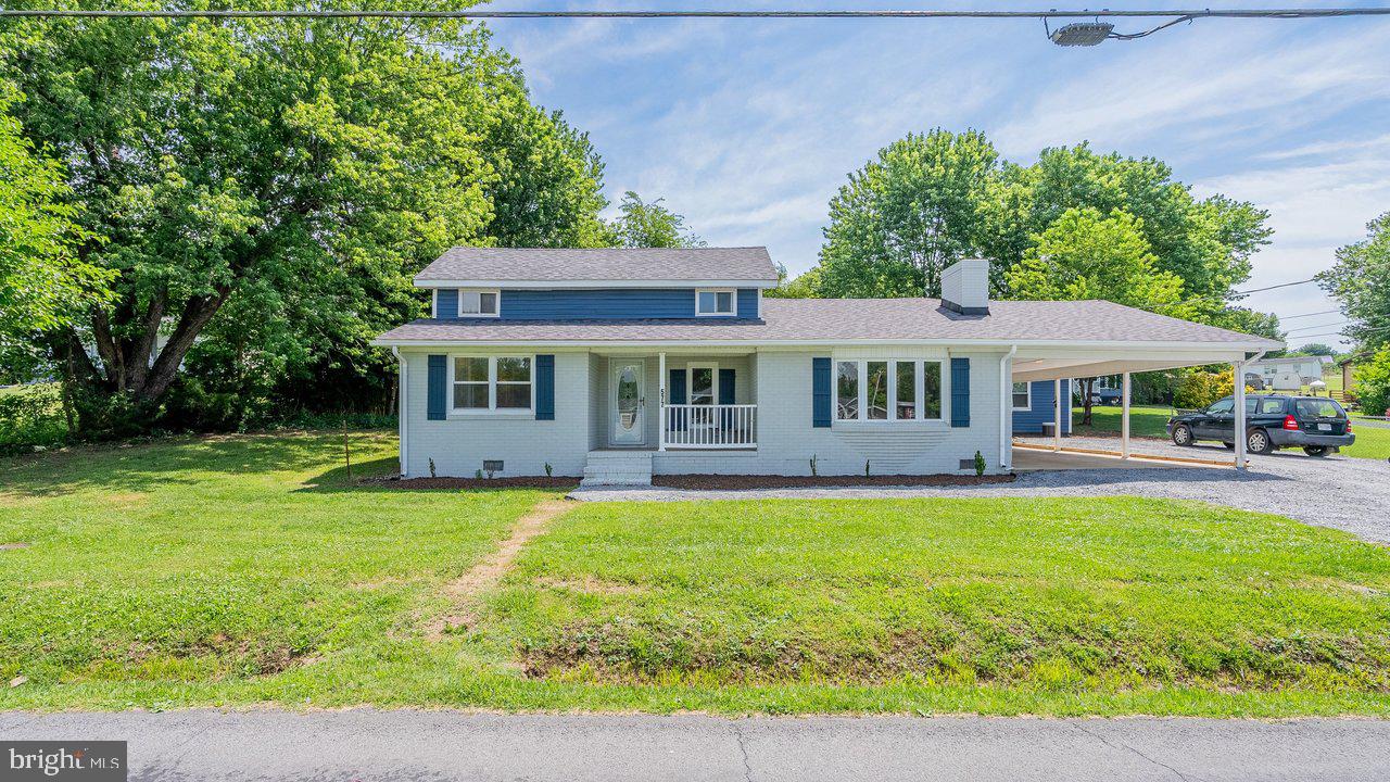 Completely renovated from top to bottom:  77 Pond Avenue is the definition of move-in ready! This beautifully updated 3-bedroom, 2-bath home offers modern finishes, functional living spaces, and an unbeatable location in the heart of Stanley. The welcoming open floor plan is centered around a cozy wood-burning fireplace and flows seamlessly into the stunning new kitchen, complete with brand-new cabinetry, countertops, appliances, and fixtures. The main-level primary suite features a private bath with a beautifully tiled walk-in shower, while a second bedroom and full bath provide convenient one-level living. Upstairs, you'll find a spacious third bedroom that's perfect for guests, a home office, or additional living space. The large backyard with plenty of room to entertain, play, or simply relax. A covered patio, carport and storage building add even more functionality to this incredible property. Located just minutes from downtown Stanley, schools, parks, restaurants, and everyday conveniences, you'll also love being close to the area's most popular outdoor destinations, including Shenandoah National Park, the Shenandoah River, George Washington National Forest, and Luray Caverns