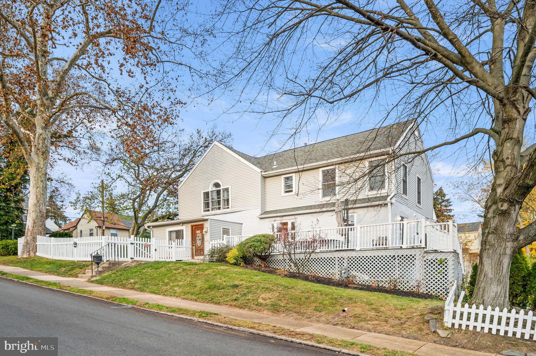 Welcome to 231 Henley Road!  This spacious 4 bed / 3 bath colonial is nestled on a cozy corner of Penn Wynne part of Wynnewood just waiting for you to call it "Home."  The highly desirable floor plan features main floor bedroom that is perfect for a guest bedroom or a home office, full hall bathroom with tiled floor and stall shower, a living room with a gas fireplace, and open concept breakfast nook with eat-in kitchen featuring granite countertops and stainless steel appliances.  Upstairs you'll find two similar sized bedrooms along with a full hall bathroom and a Master Suite that includes cathedral ceilings, 100sqf walk-in closet with built-in shelving, and a full bathroom with skylight, Jacuzzi tub, glass enclosed shower, and his/her dual sinks. The basement is partially finished and is perfect for a home office or a gym giving access to the laundry room and the garage. Outside, you'll enjoy an expansive sun-drenched wrap-around deck and a front yard with white picket fence and plenty of shade under the mature trees. The home comes with 2-zone central HVAC, hardwood floors throughout, and is located in the highly desirable blue-ribbon Lower Merion School District. Within walking distance you will find the award winning Penn Wynne Elementary, beautiful Wynnewood Valley Park, tennis courts, and the local library.  Convenient location close to public transportation and the city.   Come take a look, this one will be gone soon!