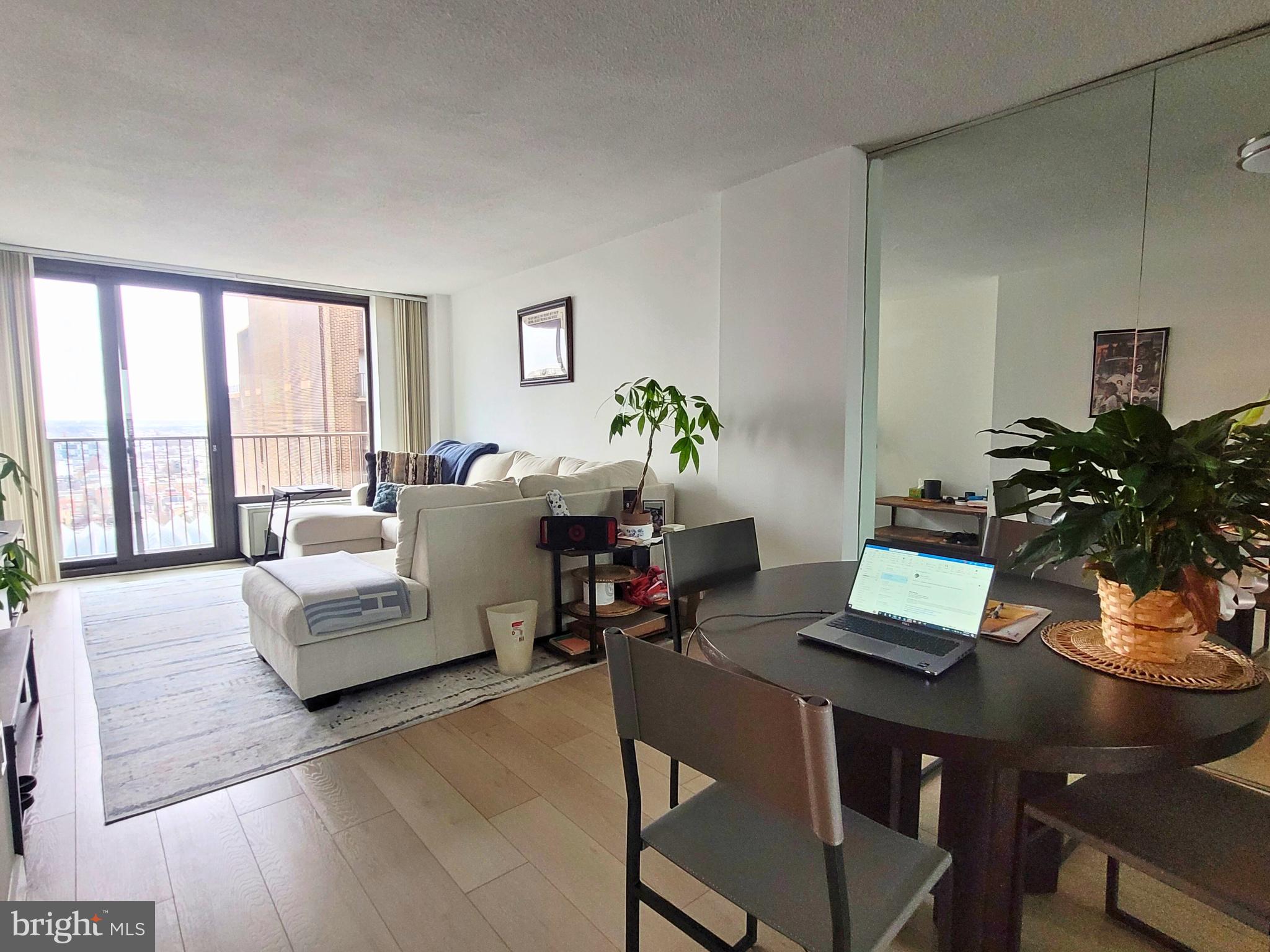 Fully renovated one bedroom with Juliet balcony and southern views on a high floor of Academy House.  Enter through a foyer with coat closet and past the modern kitchen into a spacious great room with ample space for both living and dining. There is a French balcony with views of the Kimmel Center and South Philadelphia accessible from the great room. The updated kitchen features modern white cabinetry, white countertops, white tile backsplash, and stainless steel appliances. There is a sunny and spacious bedroom with walk-in closet and an updated bathroom with a large white vanity, marble tile floor, tub shower, and stackable washer and dryer. Additional highlights include new “wood-like” floors and excellent closet and storage space throughout. Residents of Academy House enjoy a 24-hour doorman and a state-of-the-art fitness and aquatic center. There is valet parking in the building's garage for an additional monthly fee, subject to availability.  The Academy House is located in the heart of Center City and within close walking distance to Rittenhouse Square, Washington Square, and the Broad Street and Market Street office corridors. The Philadelphia International Airport and Amtrak's 30th Street Station are easily accessible.