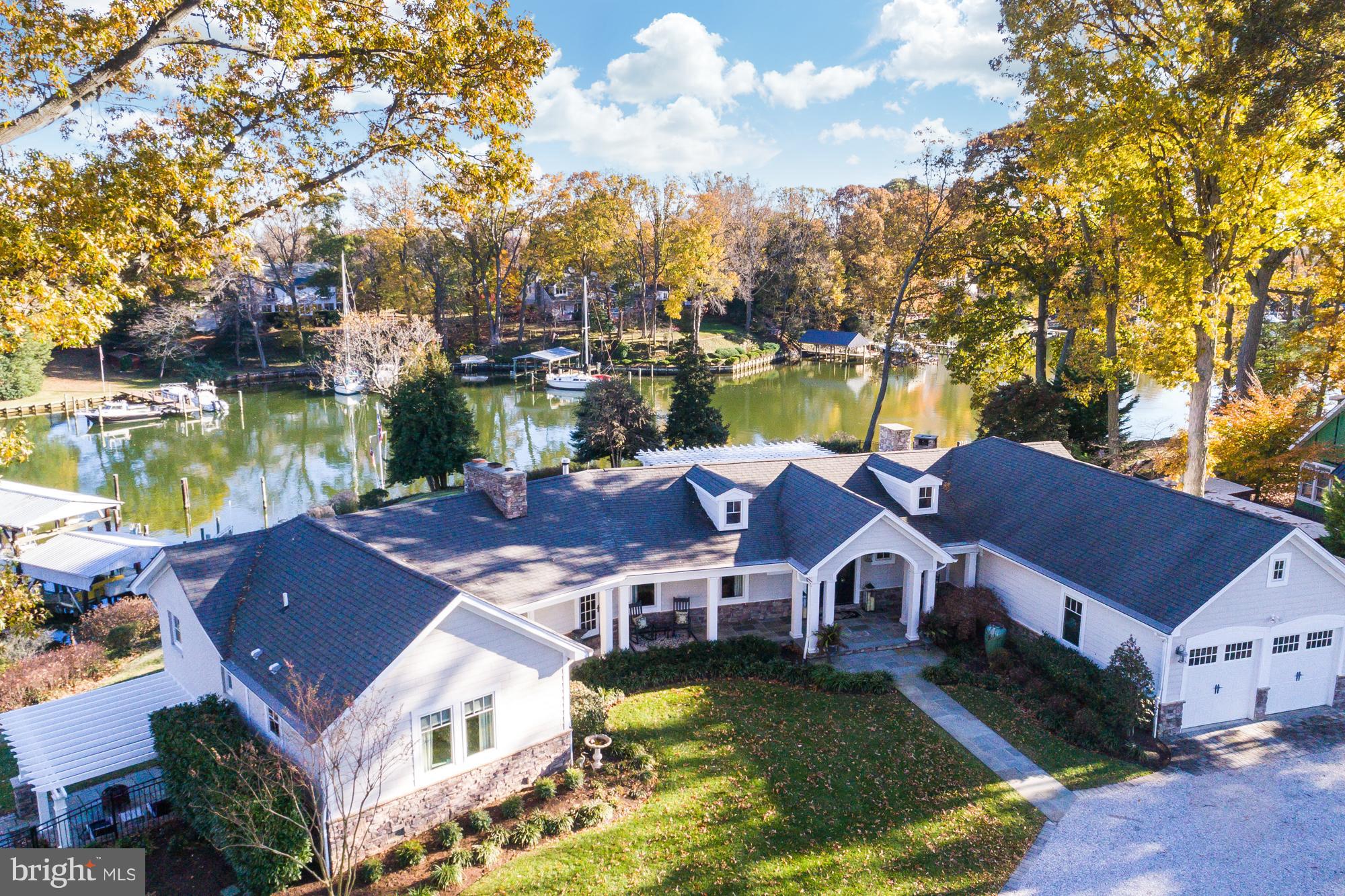 St. Margaret's protected waterfront (240 ft) "Destination for Entertaining" Home awaits you! Private prof landscaped (1+ acre) designed for every season. Boat House, deep water slips, Hot tub, Outdoor custom kitchen, fireplace, 1st floor Master Suite, Custom everything! Too many updates to list! Tastefully & purposefully created for everyone to enjoy! Short boat/car ride to Bay/ City Dock.