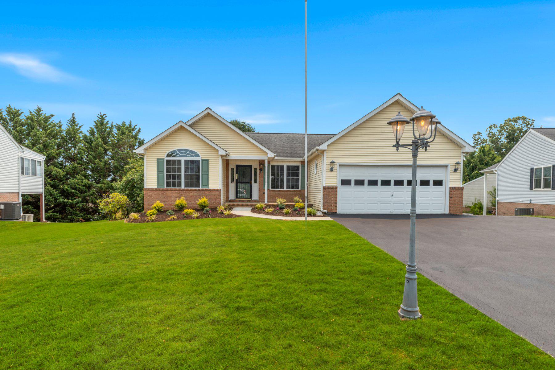 Discover the charm of this newly renovated ranch-style home where modern comfort meets timeless elegance. With a complete renovation in 2026, this residence boasts 4 spacious bedrooms and 3 full bathrooms. The fully finished walkout basement offers endless possibilities for entertainment.  Enjoy cozy evenings by the gas fireplace, while the inviting deck provides a perfect spot for outdoor gatherings or to enjoy the scenic view. The attached front-entry garage adds convenience to your daily routine. With excellent property condition and thoughtful design and renovation, this home is ready to embrace new memories. Experience the warmth and comfort that awaits you in this exceptional property-your dream home is just around the corner!