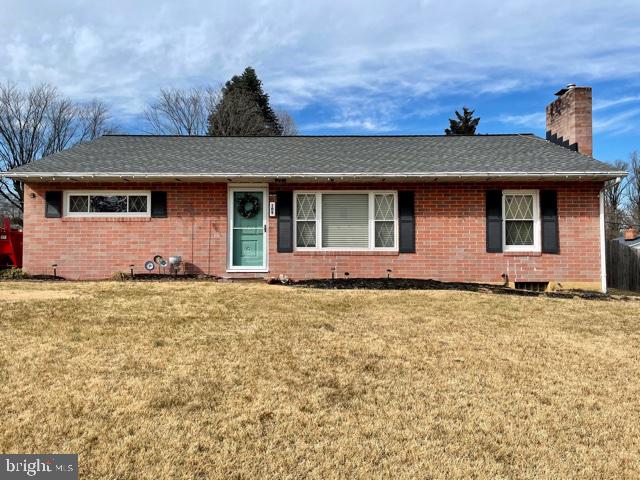 Spacious brick ranch home.  Lovingly maintained. Large kitchen with granite countertops,  stainless steel appliances, gas range, plenty of cabinet space, and tile floor.  The open concept living area features a  fireplace with mantel.  Pretty bathroom with deep jacuzzi soaking tub. Wood floors. Huge lower level with extra living space, additional bathroom, and two bonus rooms that can be used as bedrooms/office/home gym. A covered porch overlooks the fenced-in backyard.  Updated finishes and fixtures throughout.