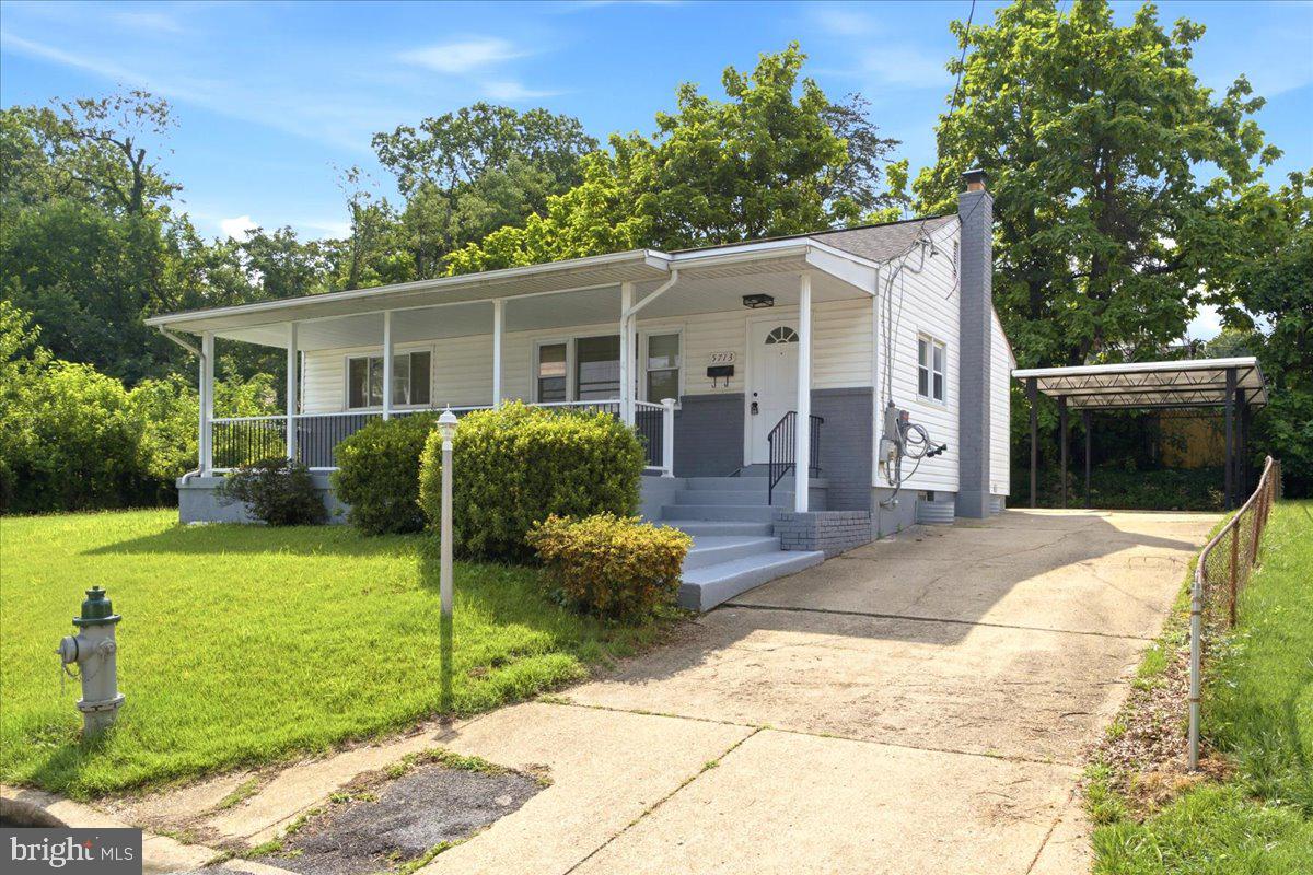 BEAUTIFULLY REFRESHED HOME!  GLEAMING HARDWOOD FLOORING AND NEW CARPETING.  NEW STAINLESS KITCHEN APPLIANCES AND NEW QUARTZ COUNTER TOPS.  BRAND NEW KITCHEN CABINETS.
NEW CERAMIC TILE BATH ROOMS.  GRACIOUS AND VERY LARGE FRONT PORCH WITH NEW RAILINGS.  BRAND NEW ARCHITECTURAL ROOF.
LARGE DETACHED CARPORT, CONCRETE DRIVEWAY WITH LOTS OF PARKING.  NEW ELECTRIC SERVICE WIRE.
NEW INSULATION AND HOUSE SEALING INSTALLED UNDER PEPCO ENERGY STAR PROGRAM.
FULLY FINISHED BASEMENT WITH REC ROOM, FULL BATH AND TWO ADDITIONAL BONUS ROOMS.
SUPER EASY COMMUTE TO DC AND SURROUNDING AREAS.