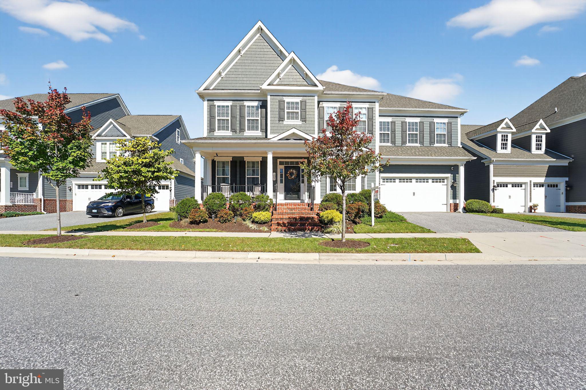 OPEN HOUSE SUNDAY 5/3 11AM TO 1PM!!!!   From the moment you arrive at 6408 Paddington Street, you’re welcomed into a lifestyle where comfort, convenience, and modern elegance come together effortlessly. Tucked within the highly desirable Greenleigh at Crossroads community, this beautifully crafted home offers the perfect blend of serenity and accessibility, with major travel routes just minutes away.  Only six years young, this spacious residence features five generous bedrooms and five well-appointed bathrooms, giving everyone room to unwind. The fully finished basement is an entertainer’s dream — complete with a theater room, a bedroom with its own full bath, and an expansive lounge area that adapts to your needs, whether it’s movie nights, game days, or relaxed gatherings.  Step outside to your own private retreat, thoughtfully designed with extensive hardscaping and a built-in hot tub that invites you to relax after a long day. The oversized yard — larger than most in the neighborhood — provides wonderful space for outdoor fun, celebrations, or simply soaking in the fresh air.  Living in Greenleigh means enjoying resort-style amenities right at your doorstep, including a sparkling pool, fitness center, children’s park, dog park, scenic walking trails, and a welcoming clubhouse. This home truly offers a warm, modern, and beautifully balanced way of living.