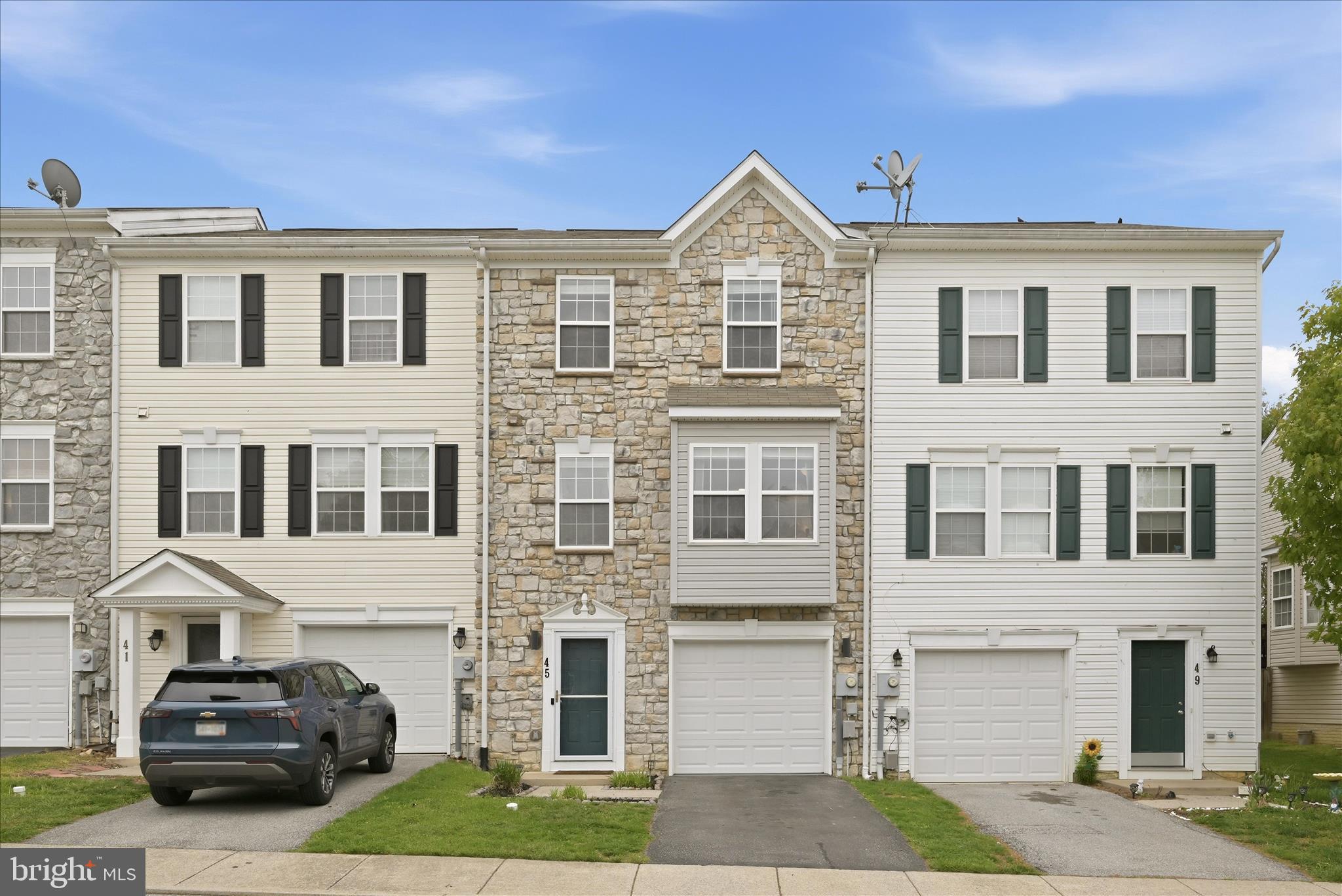 Welcome to 45 Eldon Dr, an updated, low-maintenance, and well-located home in Charles Town. This townhouse offers an entry-level mudroom connecting to an unfinished basement with laundry, offering great storage or future expansion potential. On the main floor, you have a separate kitchen and dining area that leads directly to the deck, along with a generously sized living room. Upstairs, you’ll find three bedrooms, all with vaulted ceilings and two full baths. The primary suite features a walk-in closet with built-ins and an updated en-suite shower. LVP flooring runs seamlessly throughout, and all appliances, including HVAC, were replaced in 2020. Updated light fixtures add a clean, modern feel. Out back, enjoy a fully fenced yard and a private, spacious deck with an awning, perfect for relaxing or hosting. Convenient to US-340 and WV-9, with easy access to Harpers Ferry, Martinsburg, and Northern Virginia, this is a smart, move-in-ready opportunity. *This home qualifies for a $10,000 grant for closing costs/down payment