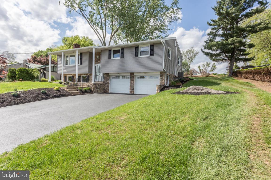 Beautiful, updated 3 bedroom home on a quiet Cul-de-Sac with a large yard and mature landscaping. New kitchen with granite countertops, breakfast bar, solid wood cabinets with tongue & grove drawers and easy close cabinet doors. Hardwood floors under new carpet through-out the main level. 2.5 baths remodeled with heated floors in the master bath. Dining room has double doors that open into a spacious screened in porch, patio doors features hidden screen. Wood burning fireplace  in the lower level family room. New siding, new front door and a insulated garage door with warranty. Very efficient boiler, new central air, seamless gutters, new hot water heater, outside motion lights and newer tilt-in windows for east cleaning. New ceiling fans in living & dining rooms and all 3 bedrooms.