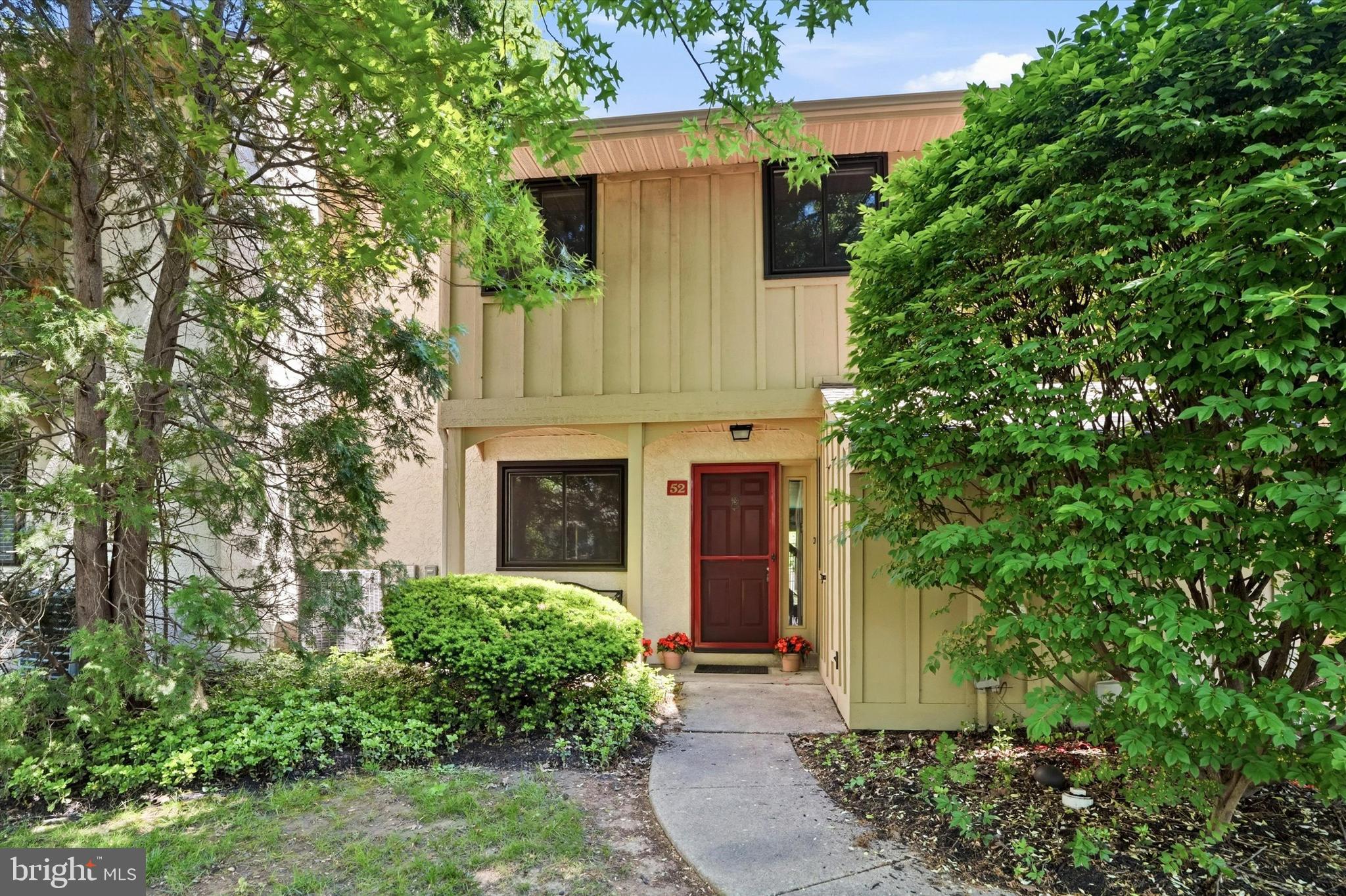 Welcome to 1110 Brinton Place Road, #52, West Chester, PA.  Located in the sought after community of Brinton Woods, from the minute you turn off of Fern Hill Road, you will get a sense of peacefulness in this quiet neighborhood!  Ironically, this home is so convenient and centrally located!  Walking up the path you will see the start of a very well maintained home!  Unlike newer construction, the mature trees and landscaping give this development an established feel!  Walk into the neutral tiled foyer with a handy powder room to the right.  The entire home was just freshly painted in a perfectly neutral beige to accommodate most tastes!   Across from the Foyer area is a cozy Den area, which features a wood burning  fireplace and built ins, elegantly outfitted with glass shelves.  The Galley Kitchen is between this room and the Dining Room for convenience; the kitchen is well-appointed with plenty of cabinets.  From the Dining Room you will flow into an expansive Living Room, which has an Anderson French door leading to the patio.  The large patio is very private and an extra perk is the beautiful redwood in view from the patio!!  One of the many in this neighborhood!  On the 2nd floor all bedrooms have custom designed closets!  There are 2 good sized bedrooms that share the hall bath that includes a tub/shower.  There is also a convenient Laundry area on this floor.  Lastly, on this floor is a generous sized Primary bedroom, with an ensuite bathroom.  Traveling up to the 3rd floor is a nicely finished bonus/storage/loft—​possibly 4th bedroom (you would only need to add a closet!)  In this market, in this area, with all this property has to offer-- this home is priced to sell and waiting for its next homeowners to enjoy it as much as the current owner has over the last 40 years!  Also, worth mentioning is the low taxes and low HOA fees!