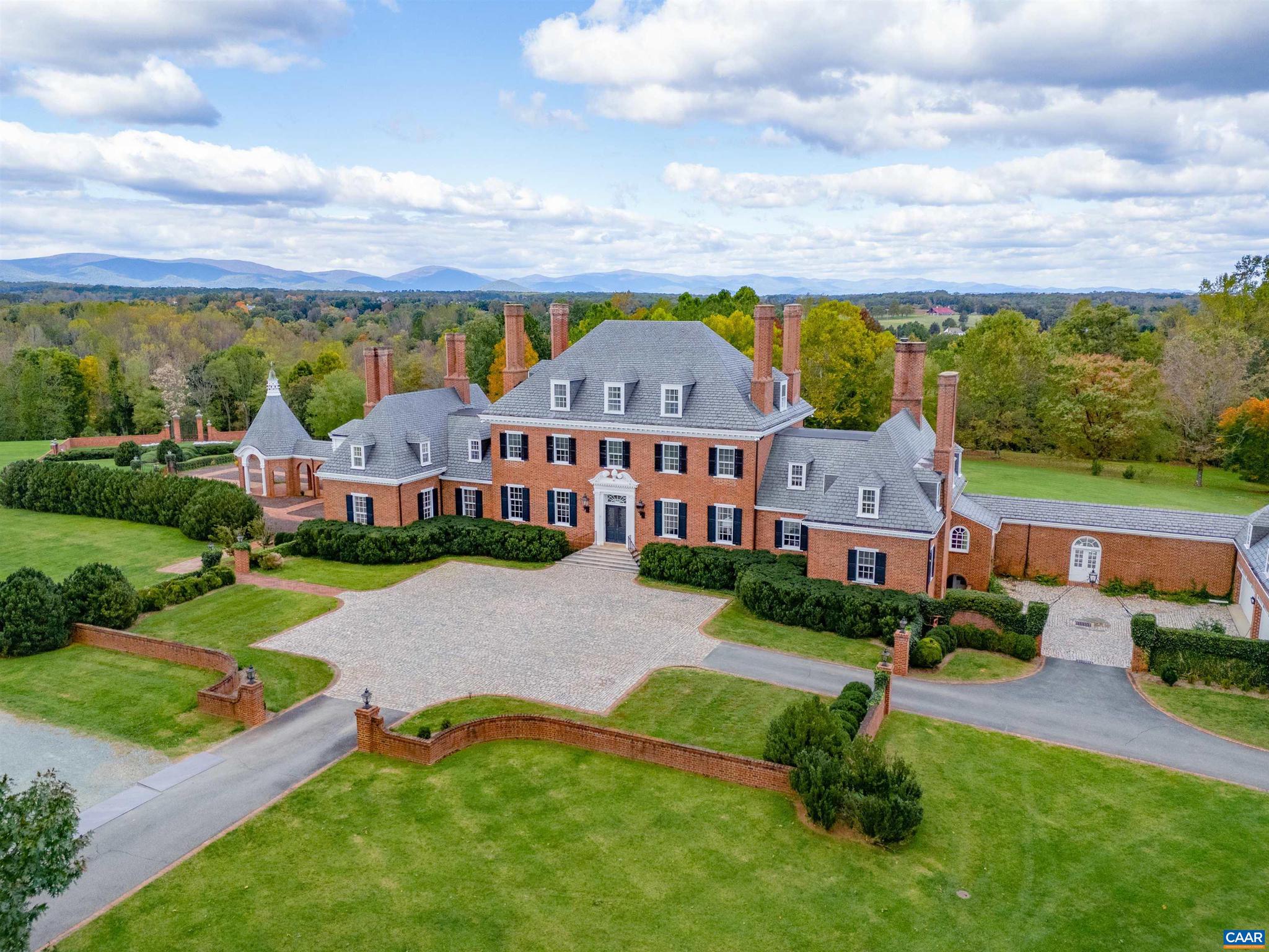 Thomas Jefferson, Stanhope, Johnson, Gillette Gardens, Farmington. Designed by renowned architect Stanhope Johnson in the Georgian Revival style, Gallison Hall is situated on 43 acres of land framed by the Blue Ridge Mountains. Enjoy a serene countryside experience surrounded by historic Charlottesville communities while being conveniently close to the University of Virginia, Barracks Road, and downtown Charlottesville. The meticulously designed grounds, courtesy of celebrated landscape architect Charles Gillette, have begun to be restored. Newly renovated one bedroom apartment with kitchen and full bath above garage. In addition to the main estate, property includes grand limestone indoor pool pavilion, pond, multi-use tennis, gym, and garage facility with an unfinished two bedroom apartment.,Fireplace in Bedroom,Fireplace in Dining Room,Fireplace in Family Room,Fireplace in Master Bedroom,Fireplace in Study/Library