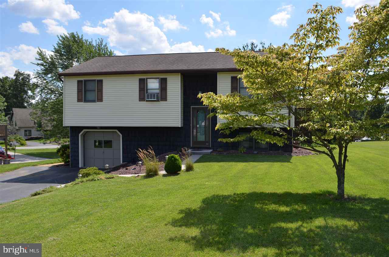 Enjoy Lake living in a fabulous home with a wonderful water view and incredible sunsets from your covered deck Nice kitchen with breakfast bar All appliances included Gas fireplace with thermostat Family room 2 full baths Large level yard Move in ready Gated community.