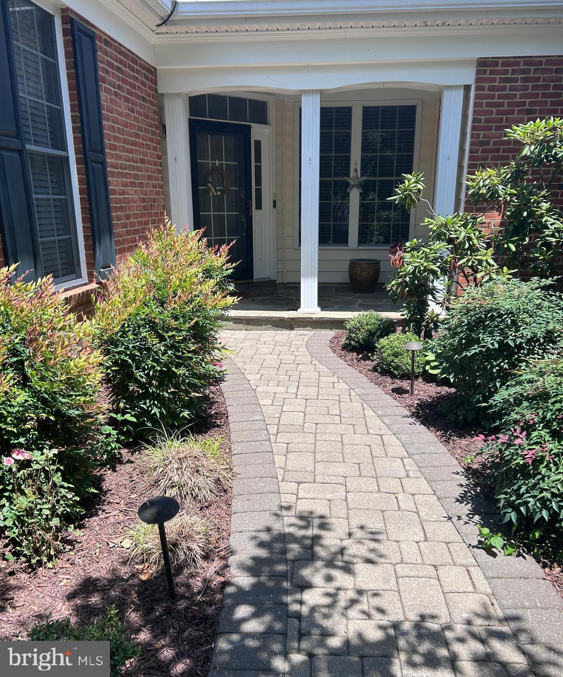 Welcome to this middle unit Villa on a cul de sac, nestled in the coveted 55+ gated community of Regency at Dominion Valley.  This two level townhouse features large windows overlooking trees and yard and the 1st hole of the golf course.  There are large skylights and vaulted ceilings, which make the home bright and airy.  The primary bedroom is on the first floor with an ensuite and walk in closet.  Also on the first floor is a second bedroom which can be used as an office; a large separate dining room, an updated kitchen with an eating area and the living room.  The kitchen was renovated in 2017 with a large amount of high end white cabinets , (ceiling to floor),  brand new upscale stainless steel appliances and Silestone counters.  The backsplash is beautiful and it accents the cooktop hood.  There is also a pantry.  The upstairs HVAC system is also new.  One of the best parts of the main level is the beautiful screened in porch looking out onto the trees and landscaping.  It is a great place to enjoy a glass of wine or cup of coffee.    The second floor has the 3rd bedroom and large bathroom.  Also there is a huge loft that looks down to the living room.  But if you want to enjoy the outdoors there is plenty to do.
         With its pristine lawns, golf course and beautiful Club house you can feel the ambiance and comfort of being home.  You can do as much or as little as you wish.  Residence can enjoy the indoor or outdoor swimming pools, lighted tennis courts, and 18 hole Arnold Palmer-designed golf course.  There are plenty of amenities including a beautiful club house and recreation  center.  Shopping is near the entrance to the community with Giant food store, restaurants, hair and nail salons, etc.