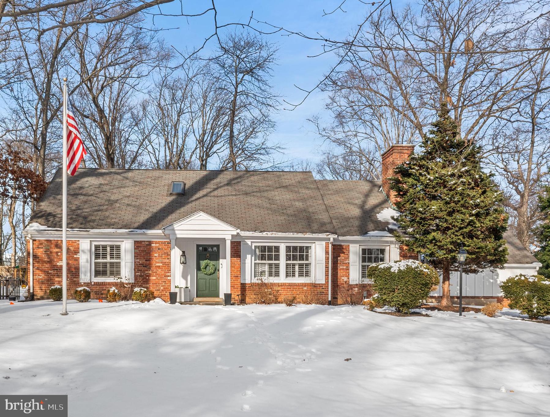 Perched on a corner lot in Radnor Township’s desirable Northwoods neighborhood, this recently renovated, light-filled three/four-bedroom Cape Cod style home boasts a new kitchen, upgraded lighting (including a Lutron® lighting system) fresh neutral paint, plus new and refinished hardwood flooring throughout. From the side driveway with two-car garage, a brand-new bluestone walkway leads to the front porch. Inside, the foyer opens to a large and sunny sunken living room with new oak flooring, plantation shutters, recessed lighting and a wood-burning fireplace flanked by custom shelving and cabinetry. Just beyond sits a bright and airy dining room with French doors opening to a rear terrace. Steps away you’ll find a brand-new kitchen (2023) with tasteful white cabinetry, quartz countertops and backsplash, higher-end appliances and direct access to the patio and fully fenced rear yard. Tucked away in a quiet corner of the main floor sits the primary suite complete with his and her closets, plantation shutters and an ensuite full bath with dual sink marble vanity and oversize glass door shower. Additional first floor highlights include an elegant powder room and a front bonus room that could easily function as a home office, fourth bedroom, gym or playroom. Skylights illuminate the gleaming hardwood staircase leading upstairs, where you’ll find two oversize secondary bedrooms each with walk in closets, a walk-in hall closet plus a neutral-colored full hall bath with new vanity. Back downstairs the finished basement offers more space for relaxation and play, plus an oversize laundry closet and additional storage area with shelving. Step outside and marvel at the private, fenced rear yard featuring a patio with retaining wall, storage shed with electric and ample flat greenspace. Current sellers completed many home improvements in their short ownership including the new kitchen, interior painting, new flooring, updated electrical including recessed lighting & new luxury lighting fixtures throughout, extensive exterior landscaping/removal of large trees, new AC condenser, epoxy garage flooring and more! Just minutes to downtown Wayne plus easy access to major roadways, King of Prussia, local parks and playgrounds. Make plans to tour this Main Line gem today before it’s too late!