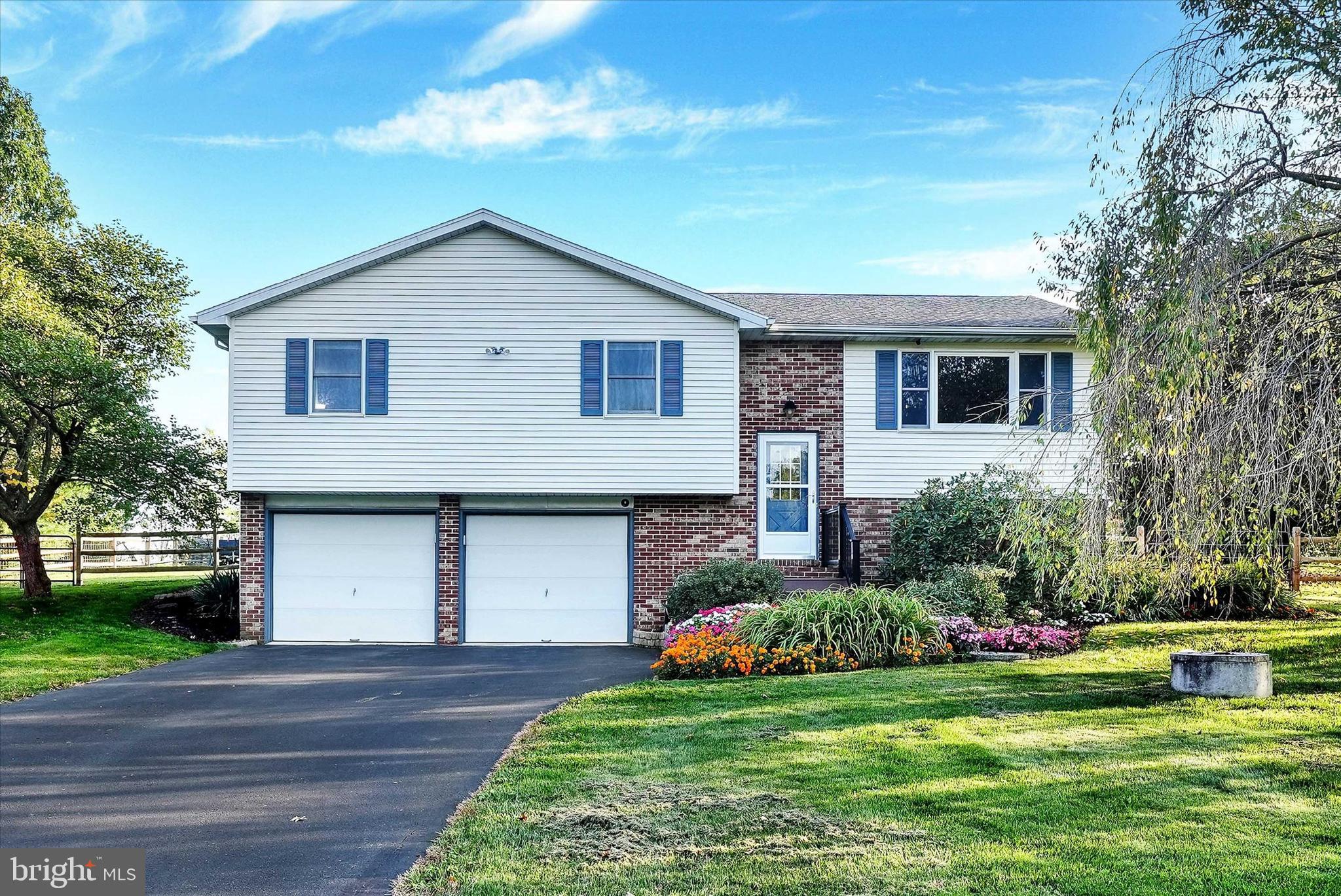 This stunning home is a must see. Located in Hamburg schools. Situated in a nice country setting on just under a 1 acre lot.. Offering 3 bedrooms, 2.5 bathrooms and a 2 car attached garage. Features a semi open concept main floor.  The living room features a large bay window, and is open to the kitchen with granite counter tops and tile floor. The kitchen inclusions are the refrigerator, double oven glass top range, microwave, and 4 saddle stools for the eat-in kitchen. There is a fully fenced in yard, a spacious trex deck as well as a 12x24 shed with a garage door.  The lower level is finished and houses a custom granite wet bar and family room. The lower level walks out to the garage. This home has been beautifully updated and well maintained.  The two full baths were newly updated in 2022 with tile floors and granite counter tops. The lower level and half bath were finished in 2021. The half bath has a granite counter top with a full size stainless steel sink to double as a laundry and/or shop sink.  The oversized garage houses the new WiFi water heater (installed 2022), new well pressure tank (installed 2022), new air handler (installed 2021), and WiFi garage door openers (installed 2022).  The septic was redone in 2018..  All the plumbing was replaced in 2021 and is PEX throughout!   The attic stairs were also installed to make storage a breeze! Schedule your showing today!!