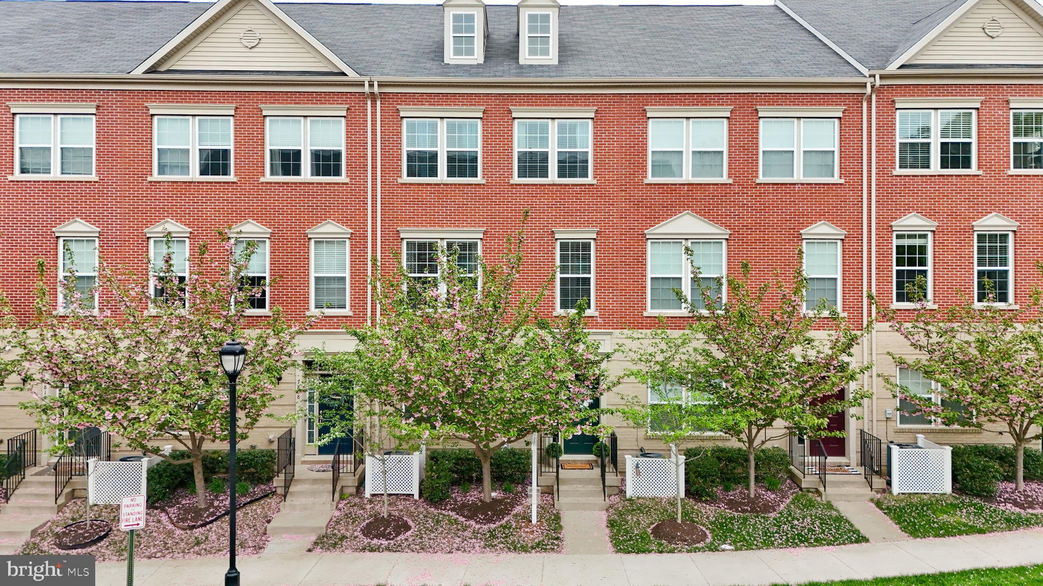OPEN HOUSE CANCELED - Under Contract - Welcome to this impeccably maintained and updated townhome in the sought-after Madison Crescent community! The ground level welcomes you with an entry area and large family room and full bathroom, as well as a finished garage with vinyl flooring and freshly painted walls. The main level boasts a gourmet kitchen with gas range, double-wall ovens, and a large island for entertaining. Granite countertops, an accent wall, tile backsplash, updated lighting and stone finish on the island create a custom look. The deck, just off the kitchen, provides convenient access for grilling, as well as a great place to relax. The huge walk-in pantry with custom shelving rounds out this kitchen with plentiful storage. The kitchen is open to the large living room with plenty of space to entertain and host. The spacious primary bedroom on the third level is outfitted with two large, walk-in closets and a luxury bathroom with a frameless walk-in shower and a separate toilet room. There are two additional bedrooms upstairs, plus a guest bathroom with double sinks and a bathtub. The laundry is conveniently located on the third floor, as well, along with a large linen closet. The entire home is outfitted with hardwood flooring and has been freshly painted. In addition to the two car garage, there is plenty of parking just outside the front of the home and throughout the community. Within the neighborhood you'll find a playground, coffee shops and various restaurants that are all walkable. You won't want to miss this move-in ready townhome, conveniently located off both Routes 29 and 15!