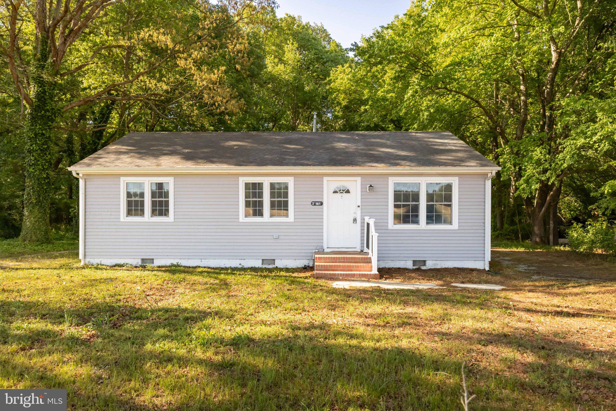 Solid, no-frills 3 bedroom, 1 bath home on just under a half acre. Walk in the front door and you’re right in the living room, which opens up nicely into a spacious kitchen—simple layout that makes good use of the space. Several big-ticket items have already been handled: new siding and carpet in 2022, vinyl plank flooring in the kitchen and bathroom in 2023, along with a new heating unit. Appliances are all in great shape and lightly used. Wraparound driveway provides easy parking and access. Located about 10 minutes south of Salisbury University and close to plenty of restaurants and everyday conveniences. This is a straightforward starter home at an affordable price point—perfect for someone looking to get out of renting or keep things simple without taking on a big renovation project.