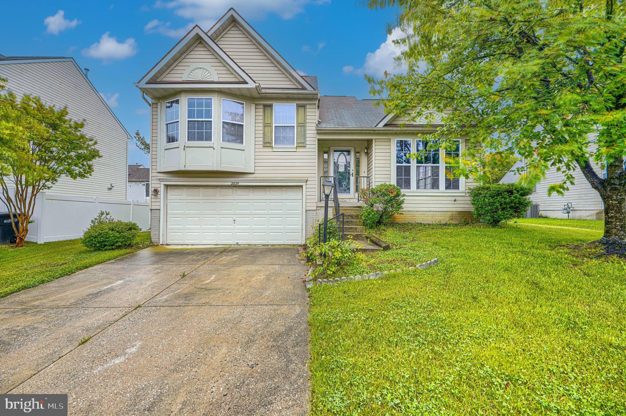 Discover this well-maintained colonial-style residence in the desirable Claybrooke Subdivision. Spanning 1,894 square feet, this home features three spacious bedrooms and two full bathrooms, designed with a cathedral ceiling and an open floor plan that seamlessly connects the living, dining, and kitchen areas, perfect for both entertaining and everyday living. Step inside to discover a warm ambiance enhanced by laminate plank flooring. The eat-in kitchen invites culinary creativity, while the adjoining dining area fosters intimate gatherings. The bathrooms are thoughtfully designed, featuring a tub shower combination that adds a touch of comfort to your daily routine. The exterior of the home is equally nice, showcasing vinyl and aluminum siding, complemented by beautifully landscaped front and rear yards. Enjoy the tranquility of your partly wooded lot, where you can unwind in your private garden or lawn space. The property is equipped with convenient streetlights and sidewalks, enhancing the neighborhood's charm. Parking is a breeze with an attached two-car garage and additional driveway space. This home is not just a residence; it's a lifestyle choice, offering a serene retreat while being close to community amenities. Experience the perfect blend of indoor comfort and outdoor beauty in this remarkable property. Schedule a showing today.