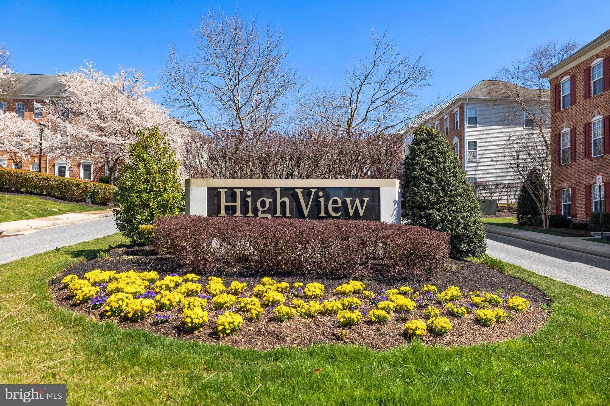 Beautifully updated 2bd/2ba unit on the 4th floor of a 5 story building with peaceful views of the courtyard.  Hardwood floors throughout living room, dining, kitchen and bathrooms.  Granite counters with a classic tile backsplash and stainless steel appliances.  Primary Suite includes a sitting area off the bedroom which is perfect for an at home office.  Updated primary bath with walk in glass enclosed shower and a soaking tub.  Second bedroom is on  opposite side with an updated glass enclosed shower.  Two separately deeded parking spots included in the space.  All furniture is also available to potentially convey.  Water Heater 2020 and newer gas furnace. Do not miss this spectacular unit!