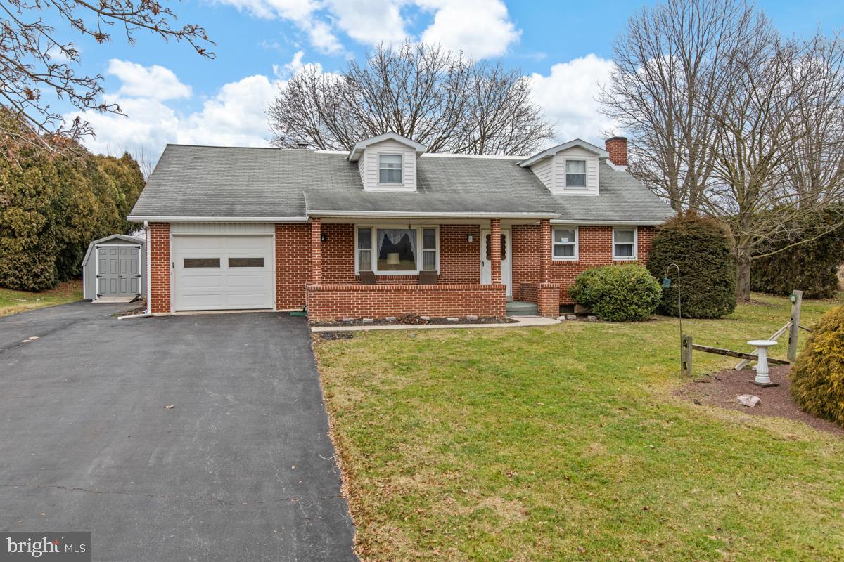 Welcome to this charming and spacious Cape Cod home located in a desirable neighborhood in the Schuylkill Valley School District.    This 4 bedroom, 2.5 bath home offers 1860 Sq. Ft. of living space.   Step into the cozy living room from the covered porch which is perfect for relaxing and taking in the view with your morning coffee.  There is gorgeous  hardwood floors under the carpet on the first floor. One of the bedrooms has the carpet out to reveal the beauty of the floors.   The eat-in kitchen is just beyond the living room.  The cabinets are beautiful and well maintained.  Step through the kitchen into this amazing 3-season sunroom with cathedral ceilings and wood beams, perfect for entertaining, reading or just relaxing.  There are 2 bedrooms, a full bath and laundry on the main level.  The laundry currently only has a washer but the outlet for the dryer is behind the cabinets which can be removed and a dryer can be installed.  Upstairs you will find 2 more bedrooms with a ton of character including beautiful built-ins and cedar lined window seats and plenty of storage spaces, even inside a closet you will find a door for more storage.  There is also a walk in attic for more storage or possibly a 5th bedroom.   Head to the partially finished basement for additional living space and a separate workshop/storage/utility room.  There are 3 heating zones, one on each level.  You will appreciate the many storage options including  two sheds, one of which is very new, plus an oversized 1-car heated garage and plenty of driveway parking.  This home is ready for you to move in and make it your own.  Conveniently located to major highways, shopping and restaurants.  Don't let this chance to own this beautiful Cape Cod home slip away.  Contact me to arrange a showing or for more details.