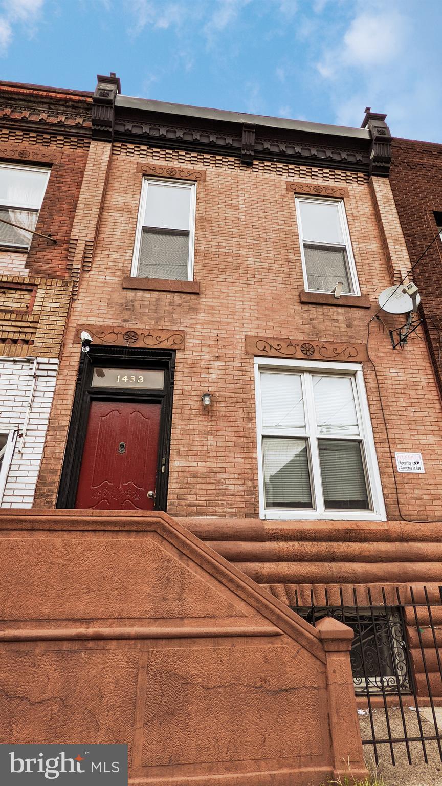Welcome to this recently updated first-floor 2-bedroom, 1-bathroom rental situated on a highly desirable street in South Philadelphia. Enjoy convenient access to the Broad Street Line, public transportation, Center City, the Sports District, and all the fantastic amenities Passyunk Square has to offer!
Step inside to find a modern, open-concept living space featuring a stylish kitchen with upper and lower wood cabinetry, a stainless steel appliance package—including an electric stove, overhead microwave, dishwasher, garbage disposal, and refrigerator—as well as a pantry for extra storage. The spacious countertop offers room for barstools, perfect for casual dining. The living room/kitchen combination leads down the hallway to two well-sized bedrooms with recessed lighting, generous closet space, and oversized windows that flood the rooms with natural sunlight. The updated bathroom features a sleek three-piece design with a shower stall. To top it off, a private rear yard provides the perfect outdoor space for relaxing or entertaining.  Access to a large, semi-finished basement with laundry.  Don’t miss out on this incredible rental opportunity in one of Philadelphia’s most sought-after neighborhoods! Schedule your showing today!