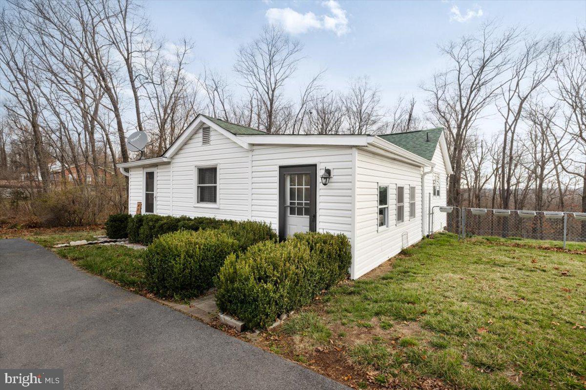 This price point and location is the rare find you’re looking for!  Welcome to this adorable rambler, centrally located just off of route 81, on the East side of Winchester, and with easy access to Northern Virginia - very easy commuter location!  This home is full of charming features throughout and has undergone recent renovations such as LVP flooring and updated lighting. The kitchen invites you to create many delicious meals, with all new cabinetry.   The unfinished walk-out basement is a blank canvas and can be finished into additional square footage. A spacious half-acre lot also provides room for a future expansion, and already comes fully fenced and with a large metal carport and storage shed. Recent updates include - Roof 2016, Septic pumped in 2022, HVAC replaced in 2023, crawl space moisture barrier and insulation replaced in 2022.  Note:  Owner is interested in leaving furnishings. OFFER DEADLINE 3PM 4/7/25.