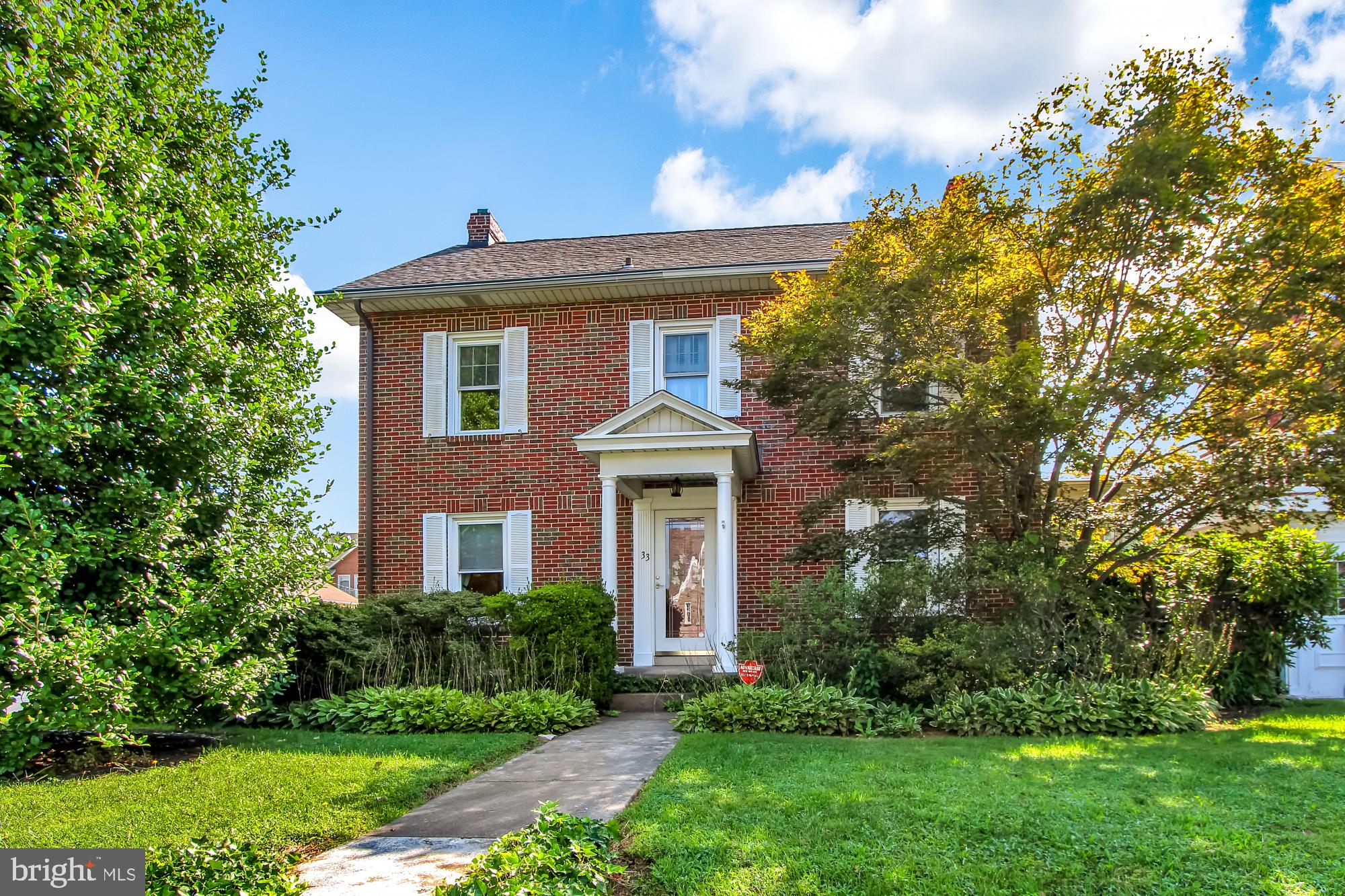 Desirable York Suburban Schools! The location is HOT being seconds to I83 and Rt30! Stroll the sidewalk streets and make your way to the community park or nearby conveniences. Solid 3-4BR, 2BA brick beauty, with detached 2-car garage. Home is set on a nice corner lot, in Olde East York, with curb appeal to the MAX. Step inside to in-laid hardwood floors, built-ins, fireplace, living room with side sunroom, updated kitchen, large bedrooms, walk-up attic with walk-in closet, partially finished lower level and a wonderful 2nd rear sunroom, overlooking a beautiful hedge-lined backyard. 2nd Floor has access to rubber roof perfect for converting into bonus outdoor living space. On-street and off-street parking, plus an oversized, detached 2-car garage make parking a breeze, and allow for tinker and storage space. Architectural Shingle Roof. Replacement windows. AGENTS - Please read Agent Remarks.