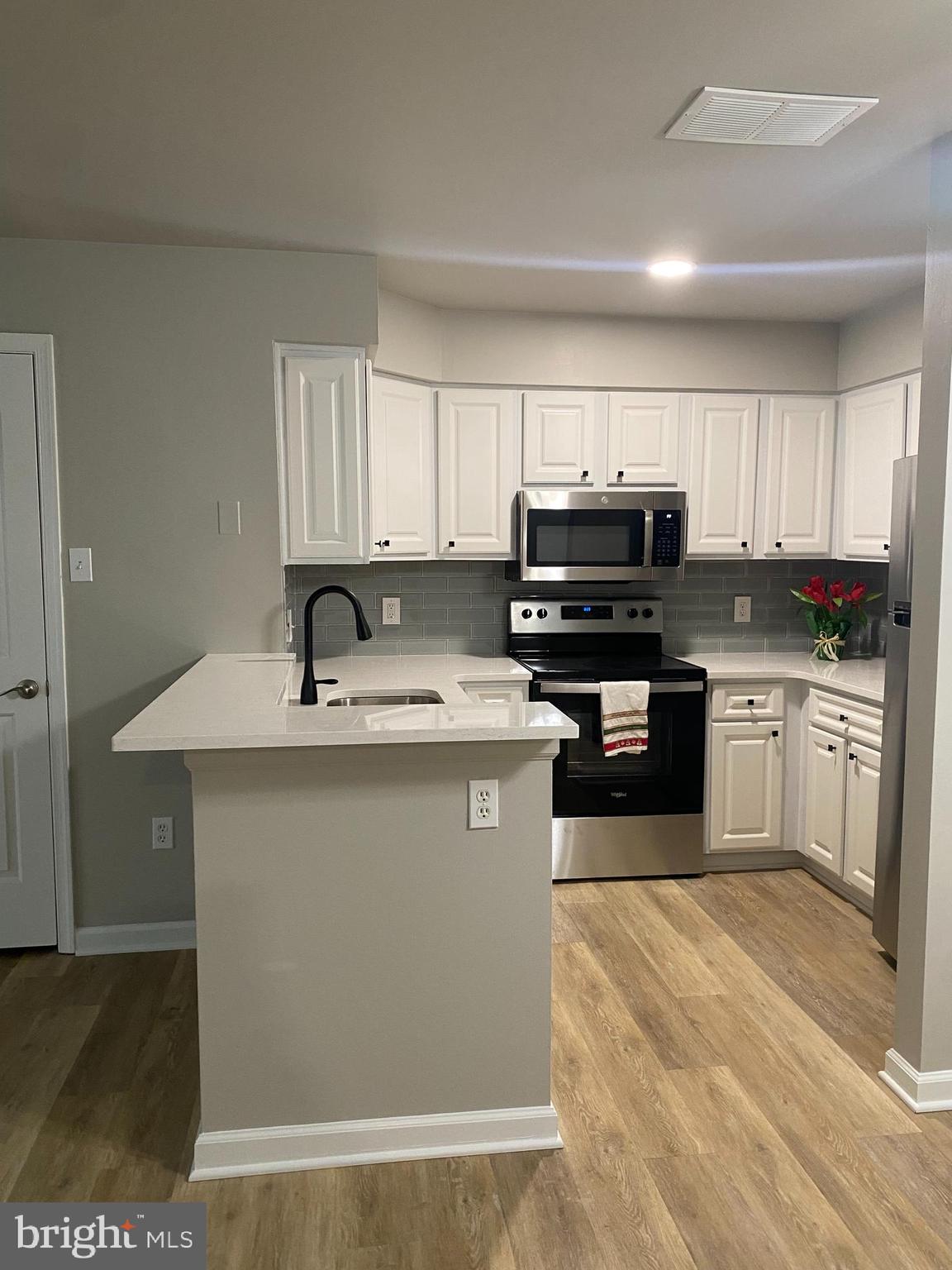 Just updated and upgraded!!!  Move right into this 1st floor sunny condo! with private entrance!  Beautiful new floors in the open floorplan!   New kitchen! with new stainless appliances ! 2 spacious bedrooms, 2 full bathrooms.  The community has a lot to offer as well!  Including a pool, clubhouse and tennis courts  plenty of open space walking distance to town and shopping, restaurants .  Water/sewer, trash  is included in the hoa dues (owner pays).  No extra rent charged for a pet!!  Association rules are only one pet is allowed.  Please check with agent about pet restriction.  Good credit, stable employment is required.