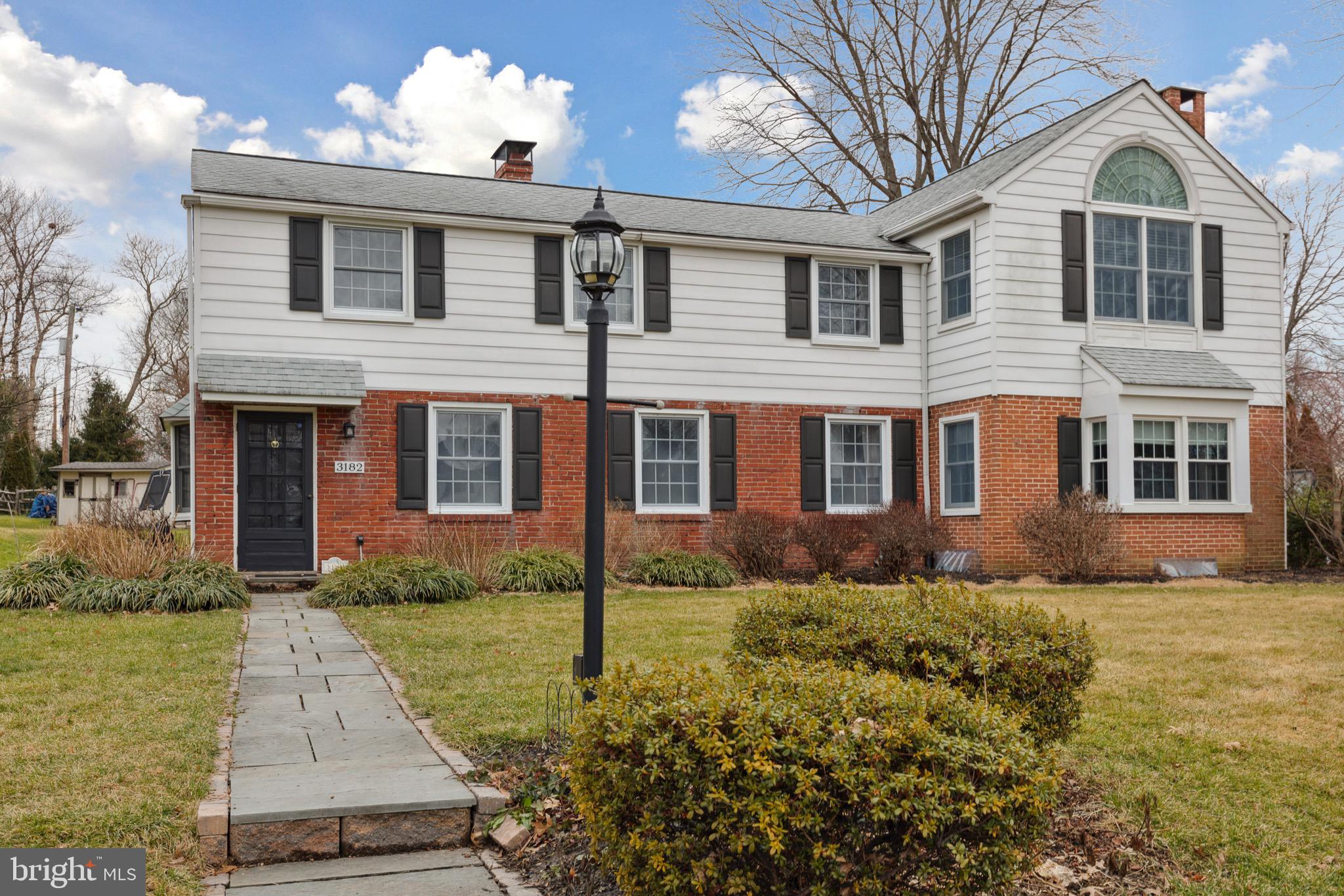 Welcome to this charming 3BR 2.5BA brick colonial located in Whitemarsh Township. With over 2400 square feet of living space, this residence seamlessly blends classic charm with modern upgrades. The open-concept layout seamlessly connects the formal living room and dining room to the kitchen adorned with ample counter & cabinet space and conveniently leading to a laundry area and powder room. A passage through the kitchen reveals a spacious great room with a wood burning fireplace and a sunlit alcove, providing suitable space for all your entertainment needs. Upstairs, discover two freshly painted bedrooms with generous closet space and a recenlty renovated full bath with tile floors, upgraded vanity and lighting and a tiled shower/bath. The third bedroom serves as a true primary suite, featuring an ensuite bathroom which has been stylishly updated with tile, new vanity and tiled walk-in shower, good sized walk-in closet, an additional cedar-lined closet, and captivating skylights set against a vaulted ceiling with wooden beams. The adjacent space to the primary offers flexibility for an in-home office or a cozy 4th bedroom/nursery. Completing the second floor is an attic providing abundant storage and access to a expansive roof deck which needs a little love but offers loads of potential. With a sizable driveway, a two-car garage, a newer roof and an unbeateable location, this residence awaits your personal touch to transform it into your dream home. Located just across the street from Plymouth Whitemarsh High School, minutes to the PA Turnpike, local parks, Whole Foods, Target and plenty of shopping and dining. Schedule a tour today!