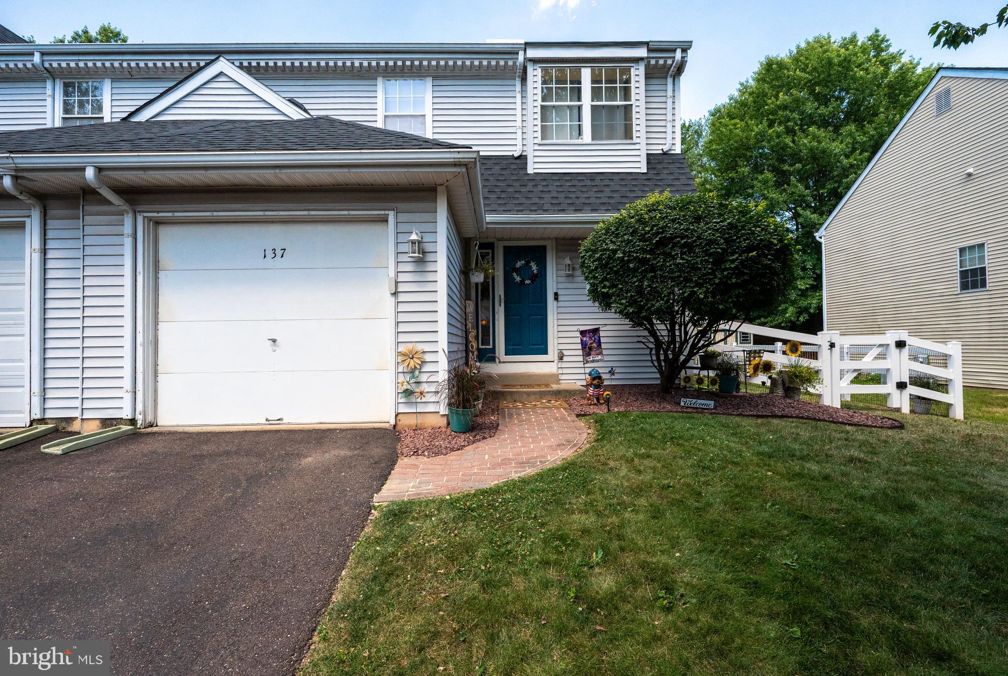 Your chance to join the Heritage Ridge community of Limerick Twp.  This 3 bedroom, 2.5 bath semi detached home has loads to offer with convenient first floor laundry, main floor powder room - open concept living/dining/kitchen and a slider to your beautiful backyard with large deck.  Plenty of green space, fenced in, with mature trees bordering the back.  The lower level is unfinished but great space to spread out your hobby tables, play area, workout equipment or just good storage.  Upstairs are 3 bedrooms and 2 full baths.  The attached one car garage is great to get your vehicle out of the elements, when needed.