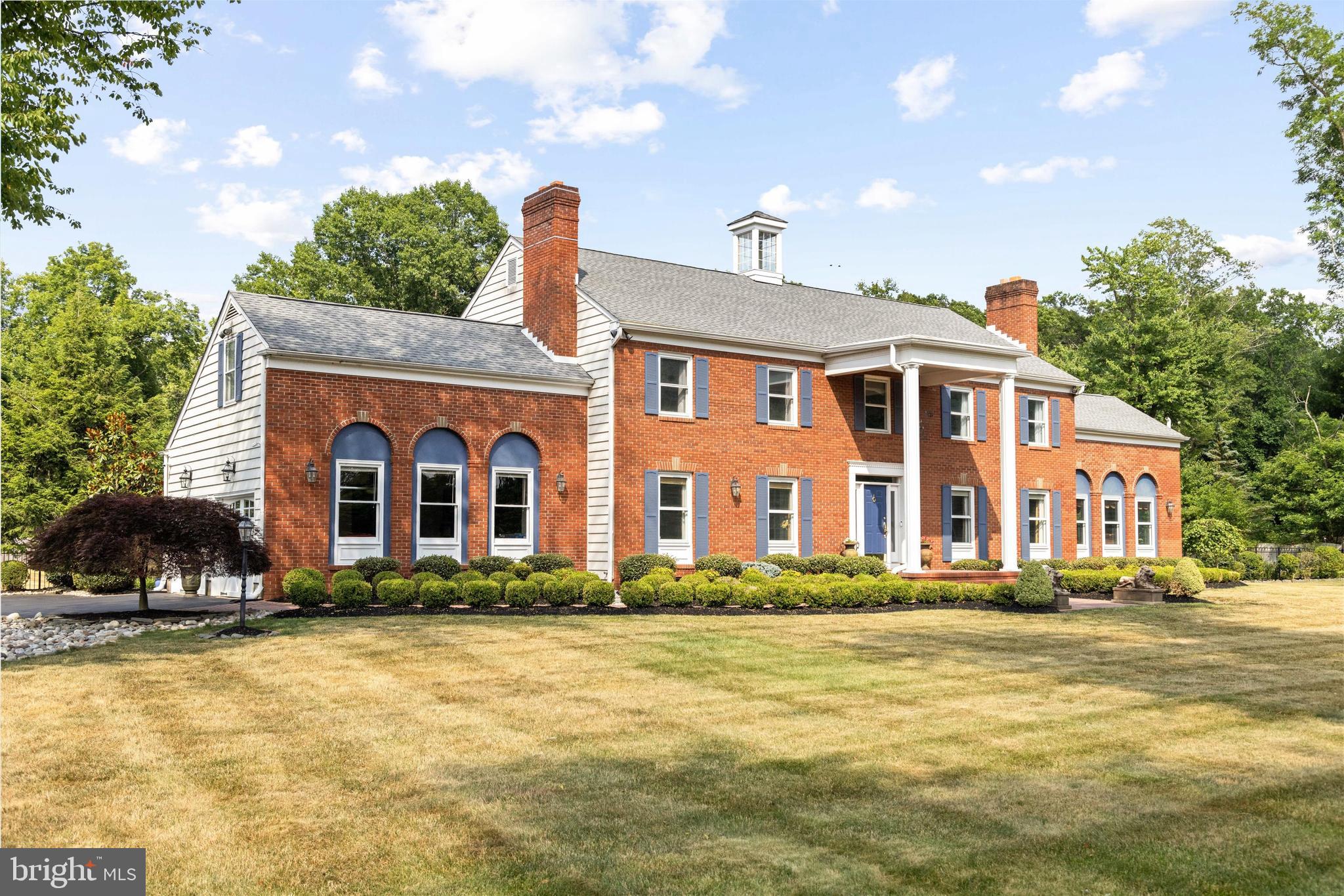 Escape to your ideal sanctuary at this beautifully maintained 5-bedroom, 3.5-bath Bowman Tower Farm home where luxury seamlessly blends with comfort. The grand center hall, adorned with intricate dental molding, leads you through the formal rooms, unveiling a custom wood mantel fireplace in the living room and a sophisticated dining room with wainscoting and a delicate ceiling medallion. The well-appointed country kitchen with its granite countertops, a central cooking island, stainless appliances, a bar sink, and a cozy breakfast area. A many-windowed family room features a brick fireplace, crown molding, and French doors leading to a covered porch. An office on the first floor adds convenience to the layout. A beautiful sweeping staircase guides you to the upper level. Relax in the master suite, offering a private retreat with a spacious sitting room boasting a wood-burning fireplace and a lavish bath. Additionally, there are 3 bedrooms, each with walk-in closets and ceiling fans, and a hall bath. The 4th generously sized bedroom with an ensuite bathroom at the end of the hall provides the potential for au pair or mother-in-law living. From the kitchen, you can access a spacious screened-in porch, as well as numerous brick terraces in the back of the house, providing a perfect spot to enjoy the fenced yard with its potential for a pool, garden or play area.  The meticulous 2+ car garage offers plenty of storage, as does the full basement which has the potential to be finished. A modern surveillance system enhances security by monitoring the property through a network of cameras placed strategically around the exterior and interior of the house.  The proximity to Brownsburg Park offers numerous recreational and lifestyle benefits such as open areas for picnics, sports and relaxation; a pavilion for social gatherings; playground equipment, basketball/tennis courts and soccer fields. For families and individuals seeking convenience and quality of life, the amenities of this property and its location contribute to a comfortable, secure and active lifestyle.  Situated in the village of Brownsburg in Council Rock School District, Upper Makefield with a New Hope address!  It doesn't get much better than that!