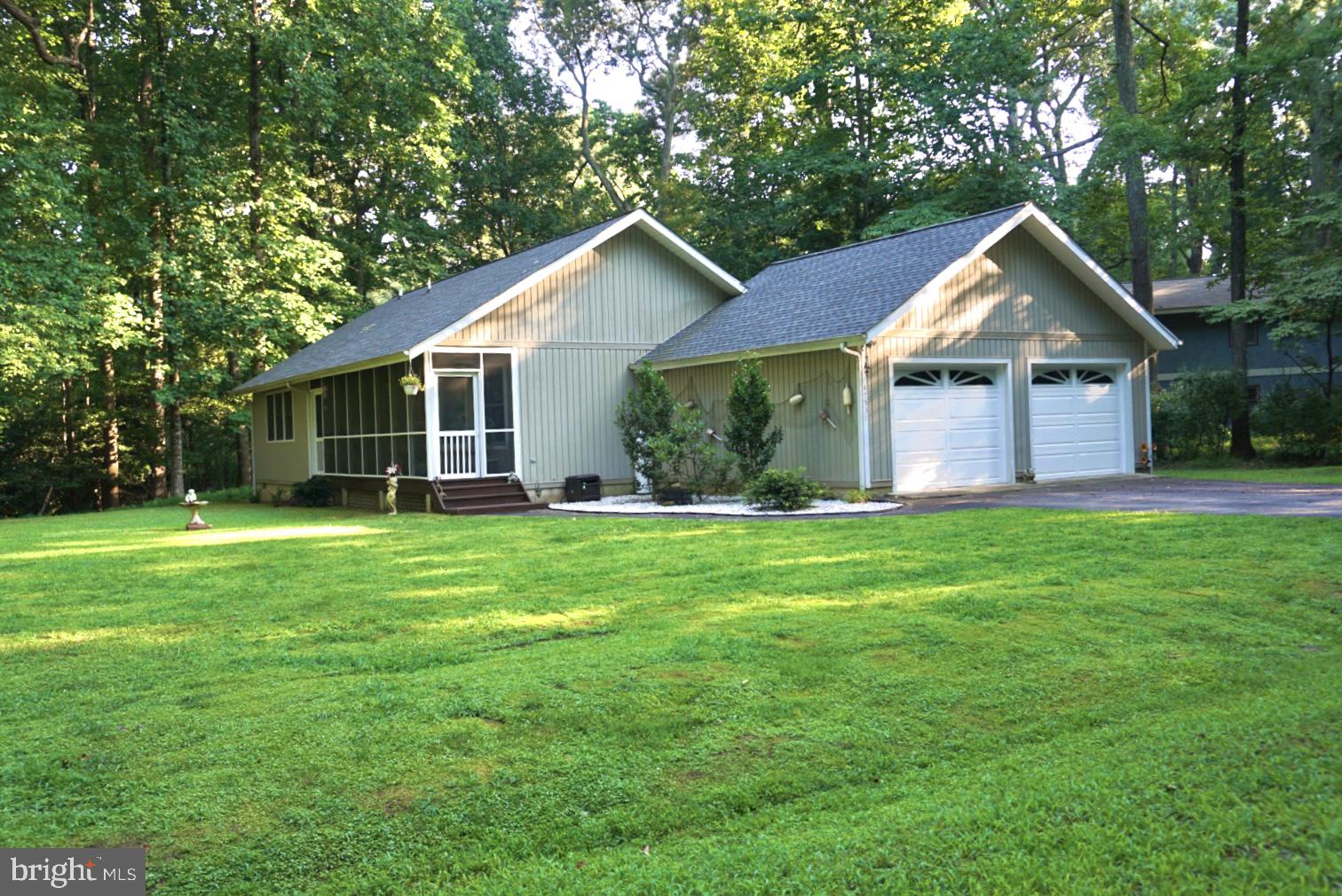 Looking for peace and relaxation? Welcome Home! This spectacular, well-kept home is located in Historical St. Mary’s City. This home has it all, it features 3 bedrooms and 2 baths, large 2 car attached garage. It also has a screened in front porch and closed in rear porch with heating and cooling that can be enjoyed year round. The home has been well maintained, to name a few…the Geothermal HVAC system was replaces 4yrs. ago, Roof replaced 2 yrs. ago, Hot Water 1 yr., Dishwasher 4 yrs.

This home offers privacy of a quiet community; connect with nature on the community walking trails and water access via the private community pier.