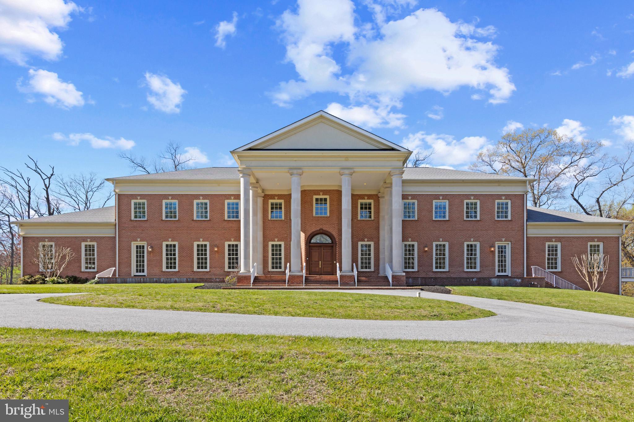Extraordinary Very Large Custom Built All Brick Home on Very Private 21 Acres Located on the N/S of Worthington Valley. Enter Thru a Huge 2 Story Marble Foyer w/ Curved Staircase Flanked on Both Sides By Sitting Rooms, 1st Floor Office, 1st Floor Primary Bedroom Suite w/ Walk In Closet, Marble Bath, & Covered Balcony. Living Room w/ Gas Fireplace, Dining Room Opens to Exterior Patio, Butler's Pantry Leads to Kitchen w/ Morning Room, Breakfast Nook w/ Curved Wall of Windows, 2 Story Granite Island,  1st Floor In Law Quarters w/ Eat in Granite Kitchen, Large Bedroom/Living Area, Full Bath and Walk In Closet. Upstairs Includes a Grand Room Flanked on Both Sides By Private Patios, 5 Bedrooms each w/ It's Own Full Bathroom, One Could Be a 2nd Primary Suite, and a 2nd Floor Family Room. 75' 3rd Level Floored Attic. Basement Includes a 3rd Kitchen , 40' x 27',  Exercise Room, Game Room, & Family Room & 4 Car Garage all at Walkout Level w/ Loads of Storage. This Quality Built Home Features Rounded Interior Corners, a  4 Story Elevator, 12' Ceilings on 1st Floor & 10' Ceilings Upstairs and in Basement, a 4 Car Garage off 1st Floor & a 2nd 4 Car Garage off of the Basement. For the Family Looking For Space Inside and Out, This is the One...