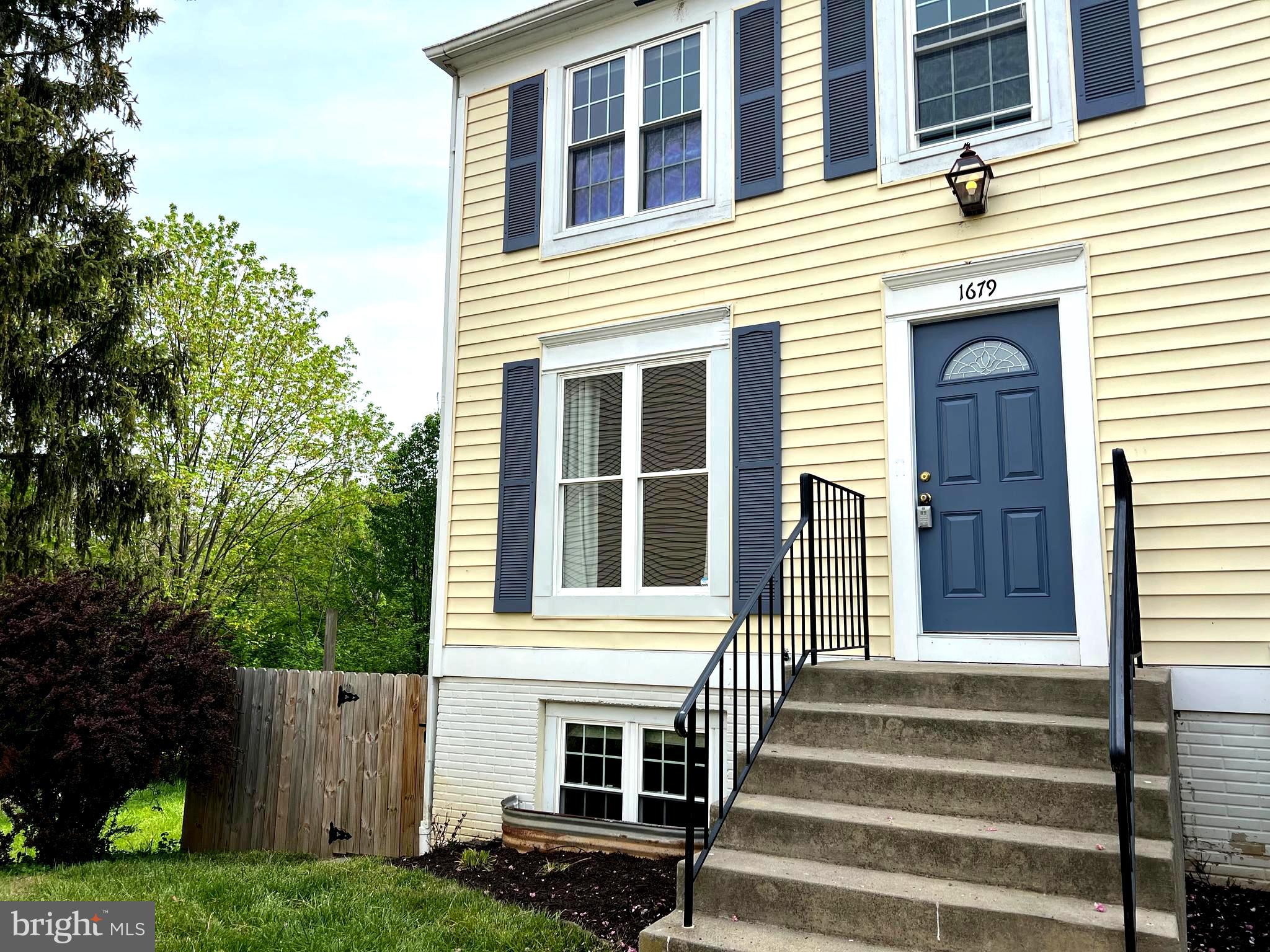 Beautifully updated end unit townhouse. 4 Bed/2 Full Bath. New carpet, laminate flooring, paint. Shades/blinds in each bedroom. New fridge and dishwasher. Updated deck with fenced yard that backs to woods. 2 Ethernet drops and cable hookup in each bedroom, main living room and basement living room. Includes 2 assigned parking spaces. Rent included water and HOA.
