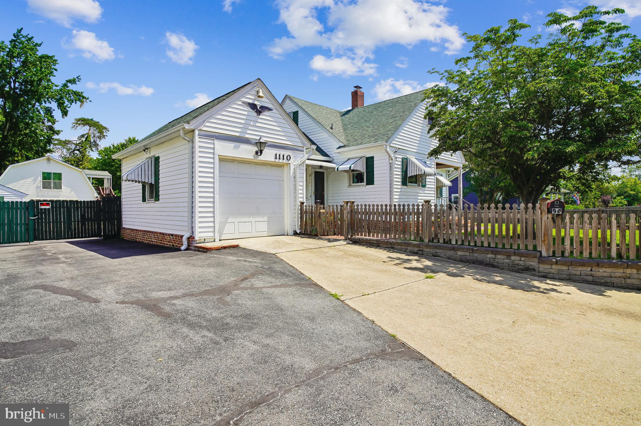 ESTATE SALE - Property being sold AS IS. Welcome to 1110 Tyler Avenue. Situated on approximately .51 acres, this loving-maintained Cape Cod shows off its old school charm with an attached garage, 3 bedrooms and 3 full baths. Ready for your updates, the main level offers an en suite primary bedroom, a second bedroom, full bath, and 2 separate living rooms. The lower level features a recreation room, dry bar with refrigerator, laundry room and full bath.  The updated kitchen with stainless steel appliances, hardwood floors, light filled living room overlooking the expansive deck, impressive back yard, and updated roof are just a few of its special features. The wow factor is the long, wide driveway that leads to an oversized, detached, 2 car garage with a half bath, an upper-level flex space, and updated roof. Close to Eastport shopping and restaurants, Downtown, and everything Annapolis has to offer.  Welcome home!