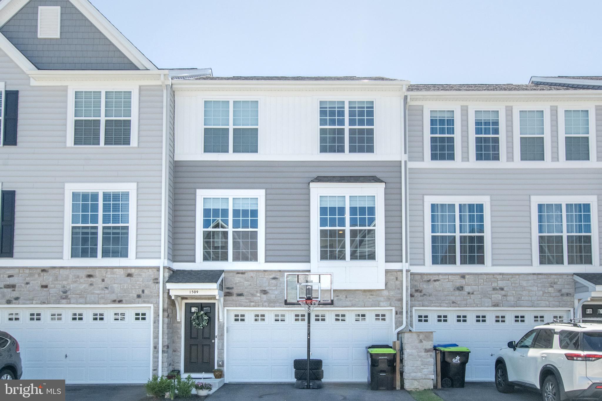 Price Improvement! Now is your opportunity! Don't miss out on this well maintained town home! Welcome to The Preserve at Robinson Farms, one of the area's most desirable new communities within the highly acclaimed Appoquinimink School District. Why wait months for new construction when this beautifully appointed, four-year-old townhome is move-in ready and available for immediate occupancy? Enjoy all the benefits of a nearly new home without the uncertainty, delays, or additional costs often associated with building from the ground up. This town home is definitely move-in ready!

This stylish and meticulously maintained residence offers three spacious bedrooms, two full baths, one powder room, and a finished basement complete with a bathroom rough-in, providing excellent potential for future expansion. Designed with today's lifestyle in mind, the open-concept main level features a stunning modern kitchen with contemporary finishes, seamlessly flowing into the dining area and inviting family room. Sliding doors from the dining room lead to a private deck, creating the perfect setting for outdoor dining, entertaining, or simply relaxing.

The upper level is highlighted by a generous primary suite featuring a private full bath and ample closet space. Two additional bedrooms, a full hall bath, and a conveniently located second-floor laundry area complete this level.

Additional features include a two-car garage, fenced rear yard, finished basement, and the inclusion of the refrigerator, washer, dryer, and a one-year home warranty for added peace of mind.
With low property taxes and affordable HOA fees, this exceptional home presents an attractive alternative to renting while offering the opportunity to build equity in a growing community. Ideally situated near the vibrant Middletown, Odessa, and Townsend areas, residents enjoy convenient access to shopping, dining, entertainment, and major transportation routes.

This is a rare opportunity to own a practically brand-new home in a sought-after neighborhood without the wait. Schedule your private showing today and experience everything this outstanding property has to offer.