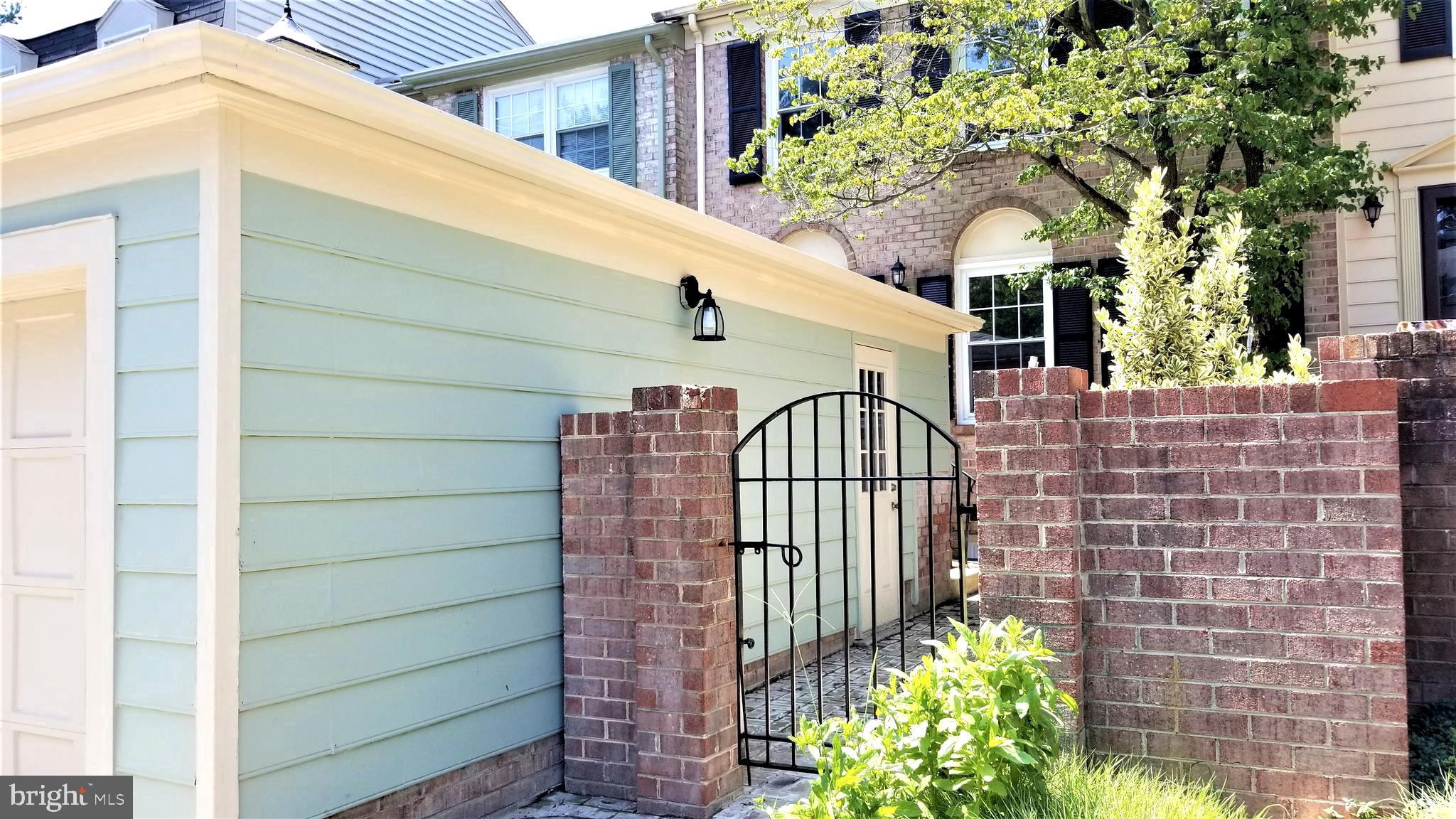 Tastefully renovated exceptionally large TH (2700sf)  with a detached garage and a gorgeous view of greens and ponds.  This home welcomes you with a lovely gated brick patio front yard that can be accessed through the garage.  Gorgeous brand new kitchen with center island, Quartz countertop, and brand new appliances. 4 bedrooms on the upper level & an in-law- suite in the basement. Light-filled walkout lower level w/recreation room to the beautiful brick patio. Brand new hardwood flooring and carpet throughout.  Renovated Master bathroom with double sink vanity.  All bathrooms are updated.   Located in a quiet neighborhood and cul-de-sac with no through traffic, yet minutes to the major highways, Rt355, R200, a short drive to the Metro and shopping.   Enjoy the amazing amenities provided by the Montgomery Village Foundation.   Owners request good credit, qualified income, and good rental history.   Sorry, no pets except a really small dog with good references.  NO commercial vehicles can be parked in the parking lot including pick-up trucks.