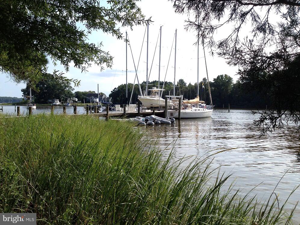 Boaters Paradise! Sail or Power - enjoy the Wye River and all the Eastern Shore has to offer. Walls of glass on entire water side with full waterviews.  100' by 6' deep water dock  with all stainless steel fasteners and a 10,000# boat lift. Dock includes a 22' by 14' over water deck and 34' by 4' finger pier.   24 by 40 free-form saltwater pool completely with pavered pool deck and retaining wall.  Owner suite renovated to include large bathroom done in all marble.  Solid cherry floors, large owners closet with custom shelving and high end whirlpool tub. Two propane fireplaces and kitchen  with granite counters and solid cherry cabinets.  New septic system (BAT) replaced in 2020. Encapsulated crawlspace.  Beautiful IPE deck. In -law suite added with travertine floors, granite counters and solid cherry cabinets.  Beautiful views of the Wye River from almost every room in the house.  All this and more just minutes to the Chesapeake Bay Bridge.  Close to Washington DC, Virginia, Delaware and PA.  Close to airports.                             Welcome to the Eastern Shore of Maryland.