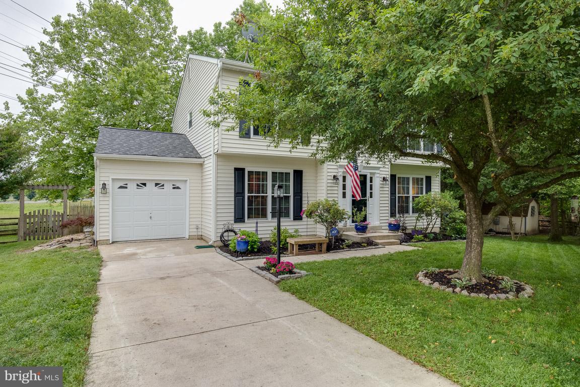 Pack your bags...this one won't last long! 4BR 2.5BA w/ upgrades throughout. Kitchen w/SS appl & ceramic back splash. Great Rm w/brick wood burning fireplace. Relax in the master suite w/WIC & upgraded bath. Entertain on the screened porch overlooking level, fenced backyard perfect for summer BBQs. Great location...close to shopping, dining & more. Community amenities include playground and pool.