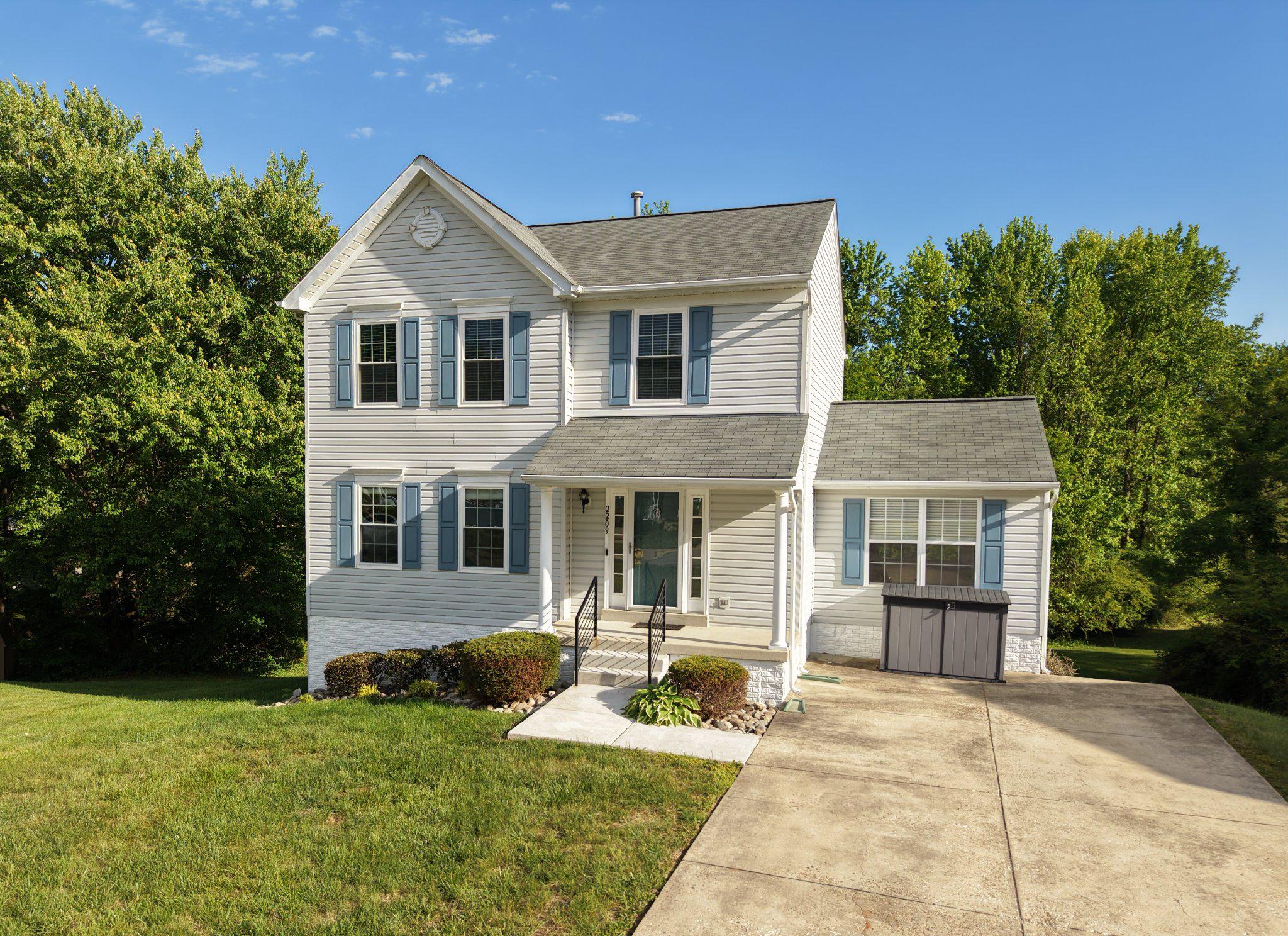 Nestled in the charming South Hampton community, this delightful Colonial home offers a perfect blend of comfort and style. With 1,760 sq. ft. of thoughtfully designed living space, this residence features three spacious bedrooms and two and a half bathrooms, ideal for both relaxation and entertaining. Step inside to discover a warm and inviting interior, highlighted by beautiful hardwood floors and carpet throughout. The combination dining and living area flows seamlessly into a cozy family room off the kitchen, creating an ideal space for gatherings. The kitchen boasts upgraded countertops, an island for additional prep space, and modern appliances, including a gas range and dishwasher, making meal preparation a joy. Enjoy the tranquility of your 0.31-acre lot, which backs to serene trees and is located on a peaceful cul-de-sac. The outdoor space features a welcoming porch and deck, perfect for morning coffee or evening relaxation. The South Hampton community is known for its friendly atmosphere and convenient access to local parks, schools, and public services. With easy access to shopping and dining, everything you need is just a short drive away. This home is not just a place to live; it's a place to create lasting memories. Experience the comfort and community spirit that South Hampton has to offer! Schedule your private tour today.